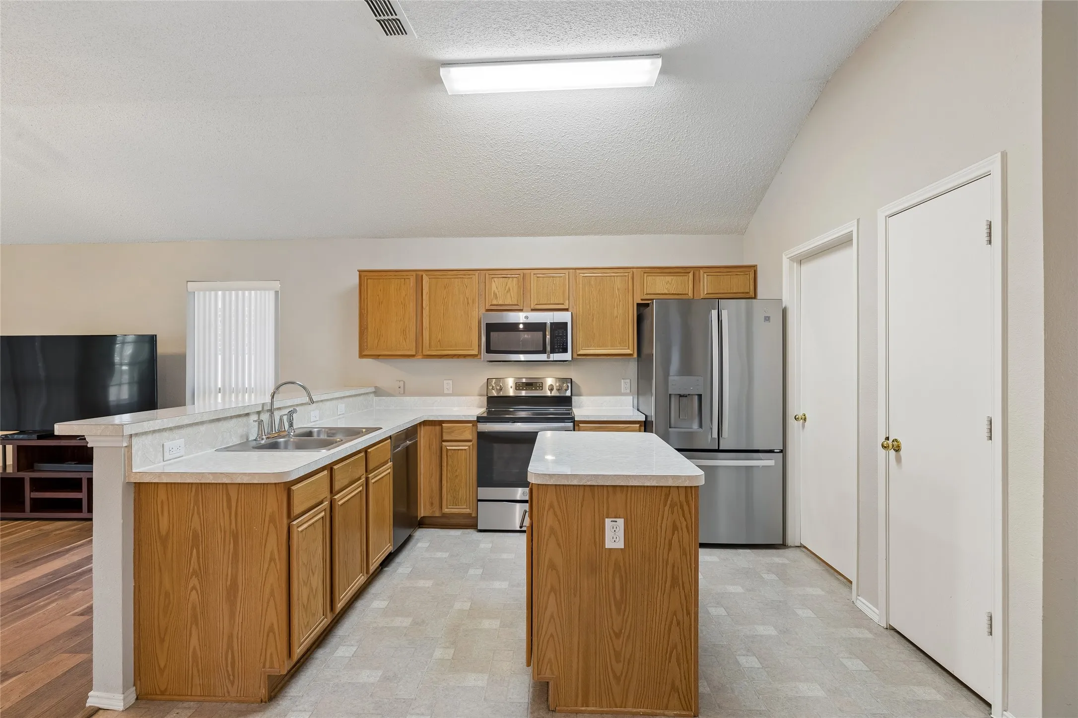 Another view of the nice kitchen. Note the first door opens to the pantry. The second door opens to the Utililty room.