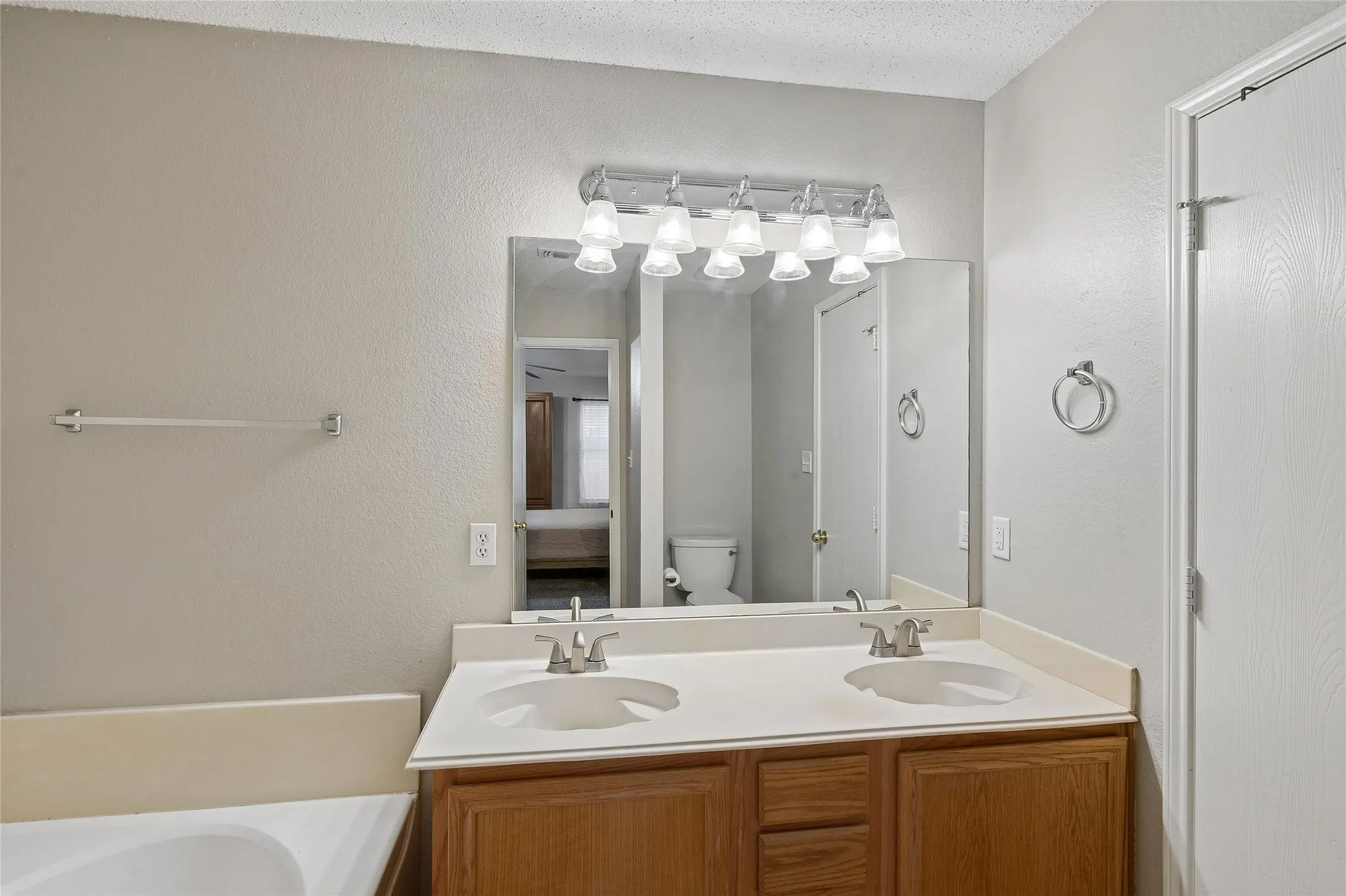 Primary bathroom, with double lavatories, bathtub & seperate shower..