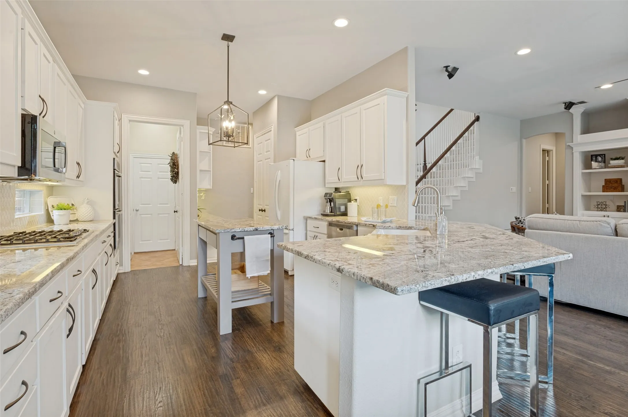 Lovely cabinetry, new pulls, counters and backsplash