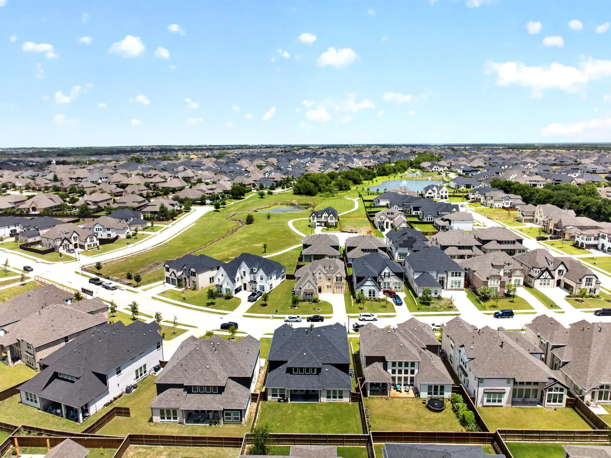 Expansive residential community featuring diverse architectural styles and mature landscaping