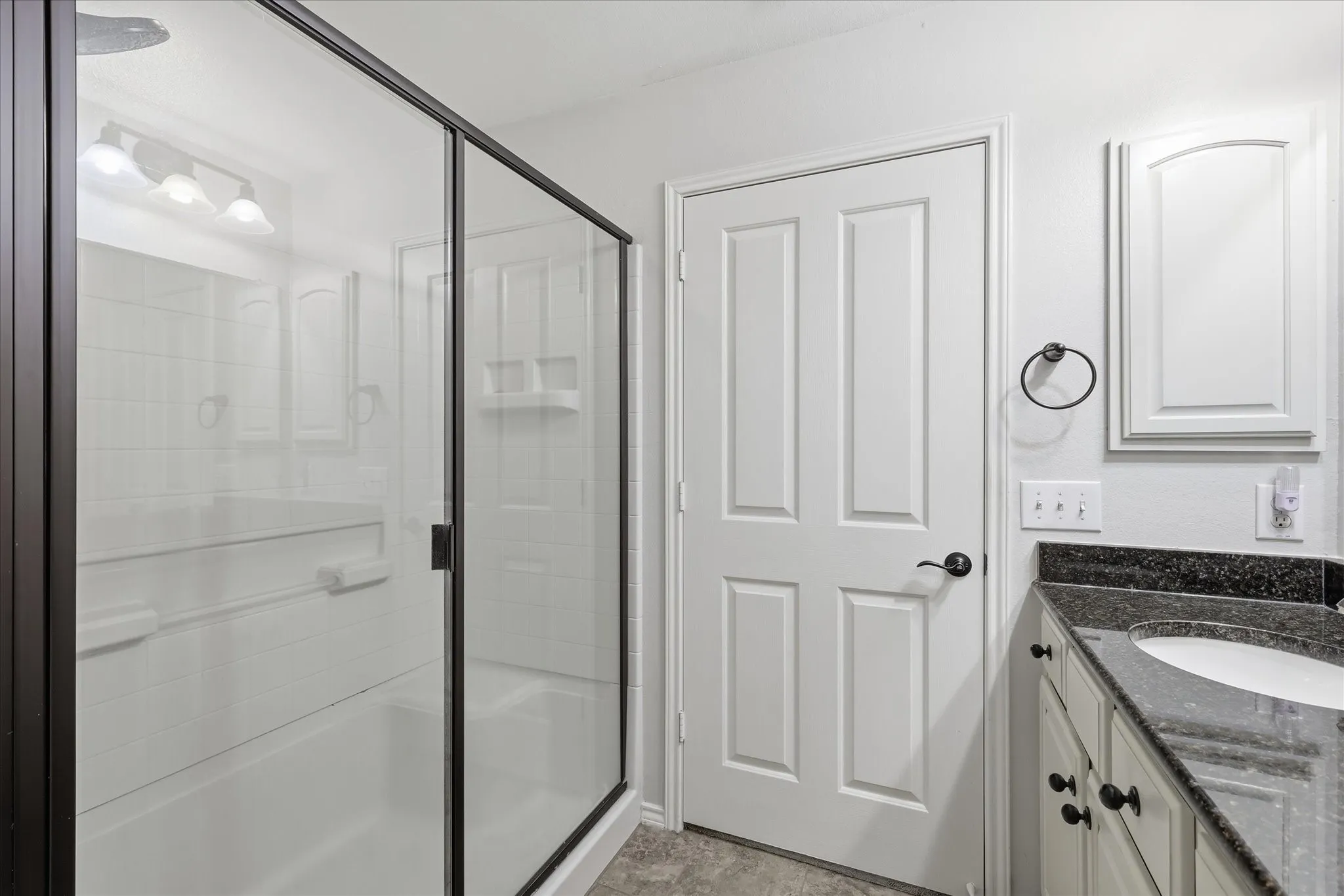 Primary Bathroom with walk in Shower and Walk in Closet