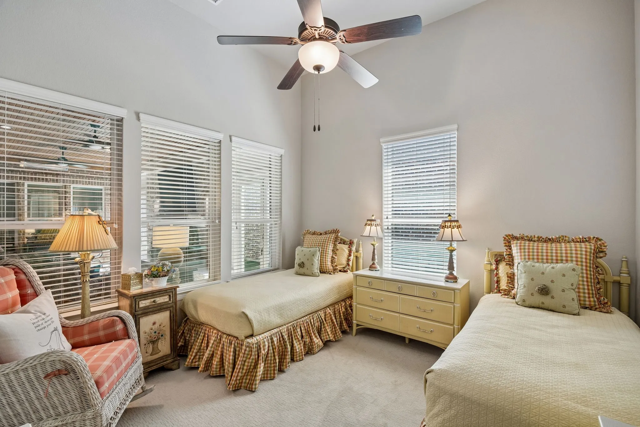 Generously sized guest bedroom with walk-in closet.