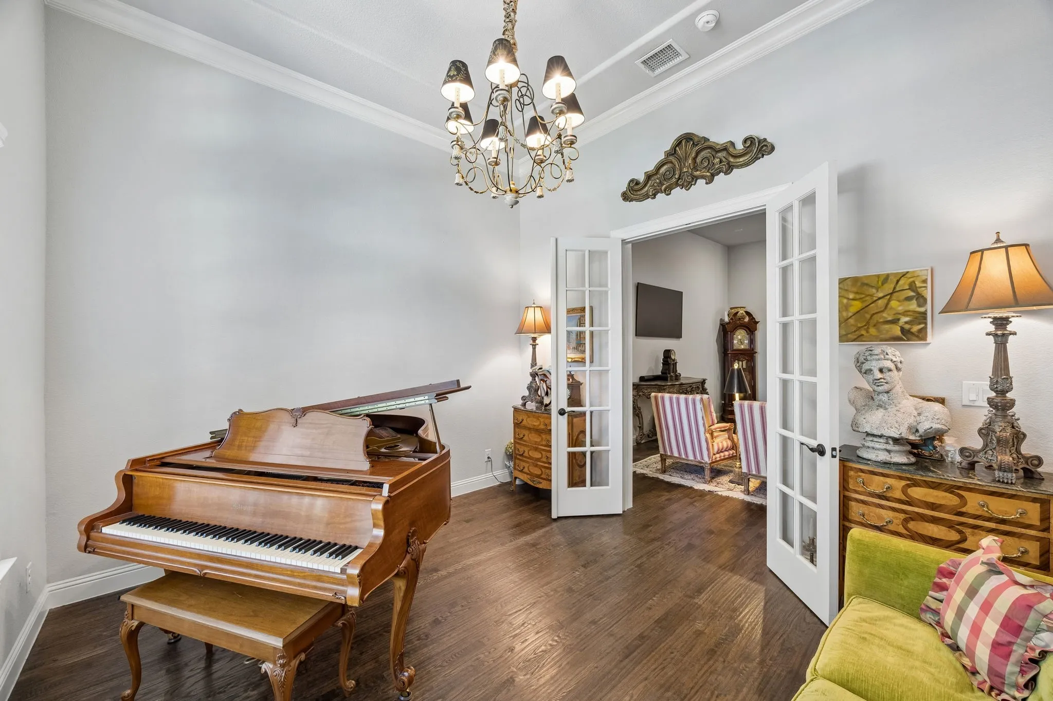 Another view from office or multi-purpose room into the main living with privacy French doors.