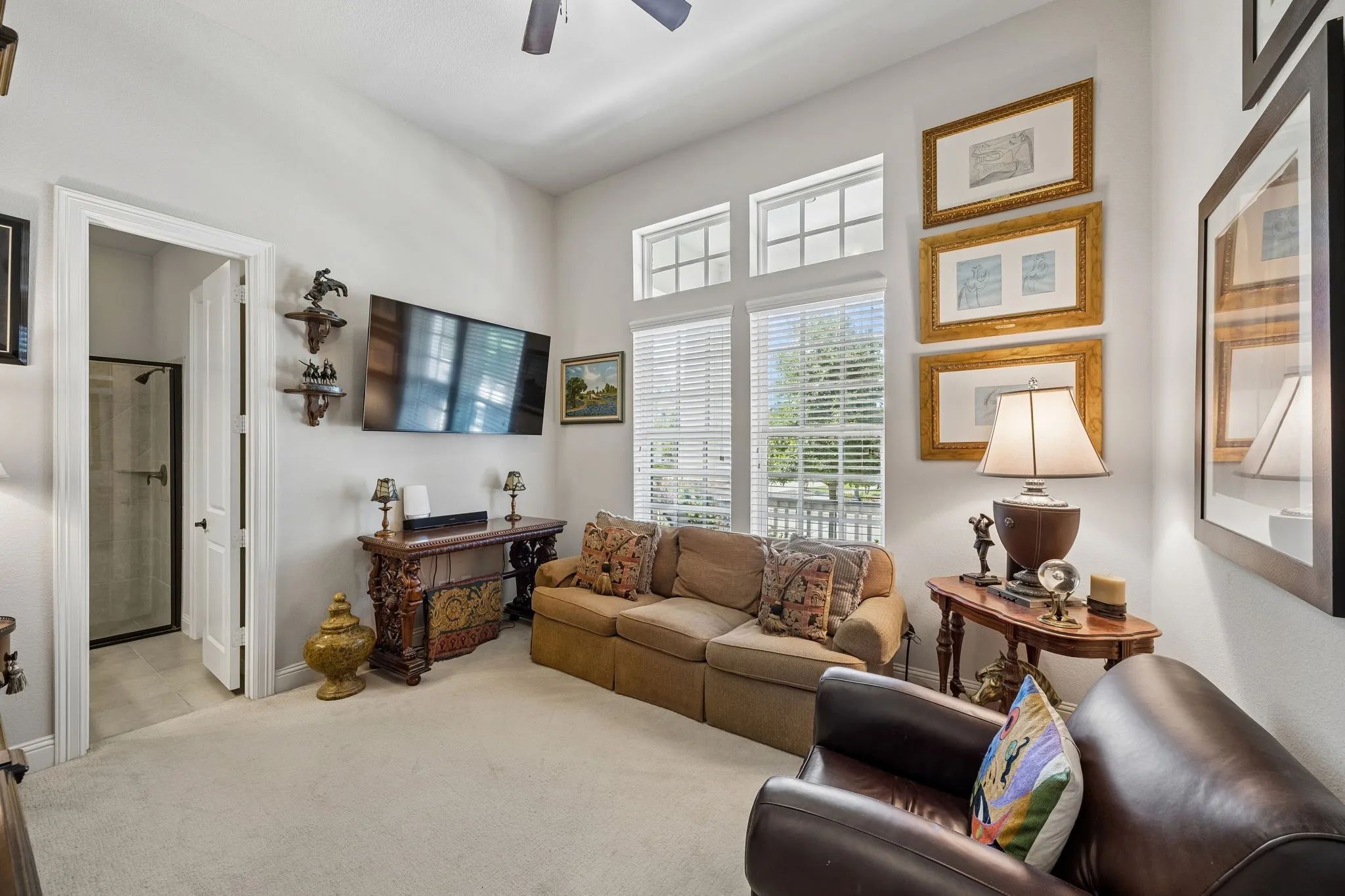 Currently used as a man-cave, this is an additional guest bedroom with ensuite bath and walk-in closet.