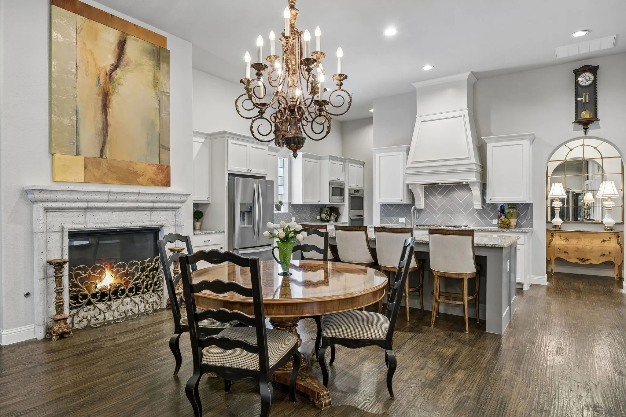 One of the dining areas flanked by a fireplace adding a cozy and elegant atmosphere.