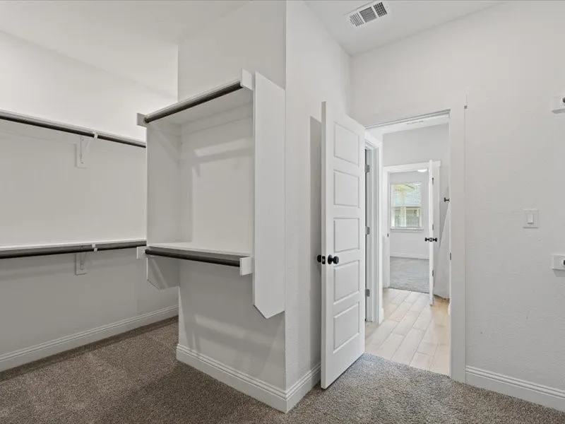 Primary Bedroom Walk-in Closet