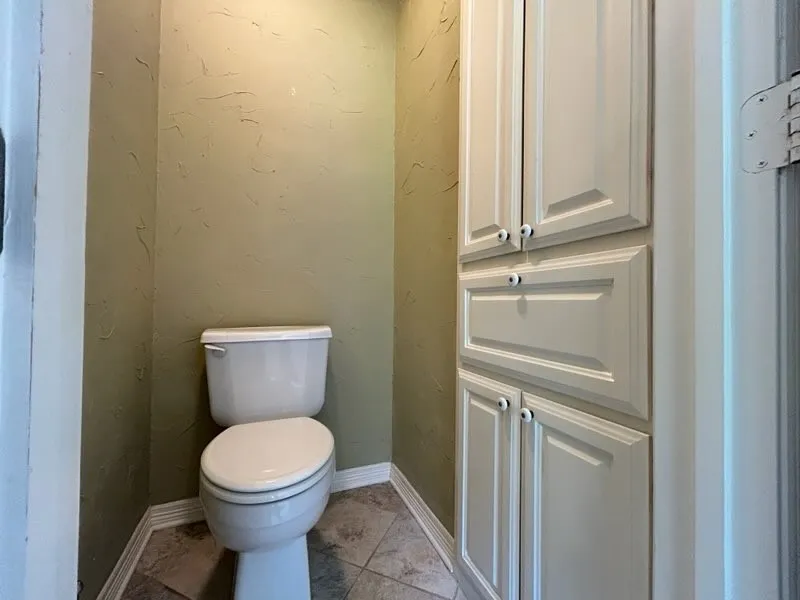 Linen closet located in the primary bathroom