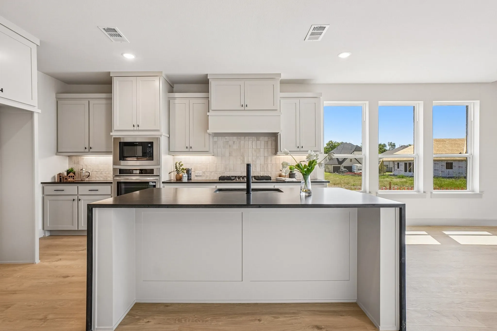 The spacious island is the hub of this dream kitchen and the perfect place for friends and family to gather round!
