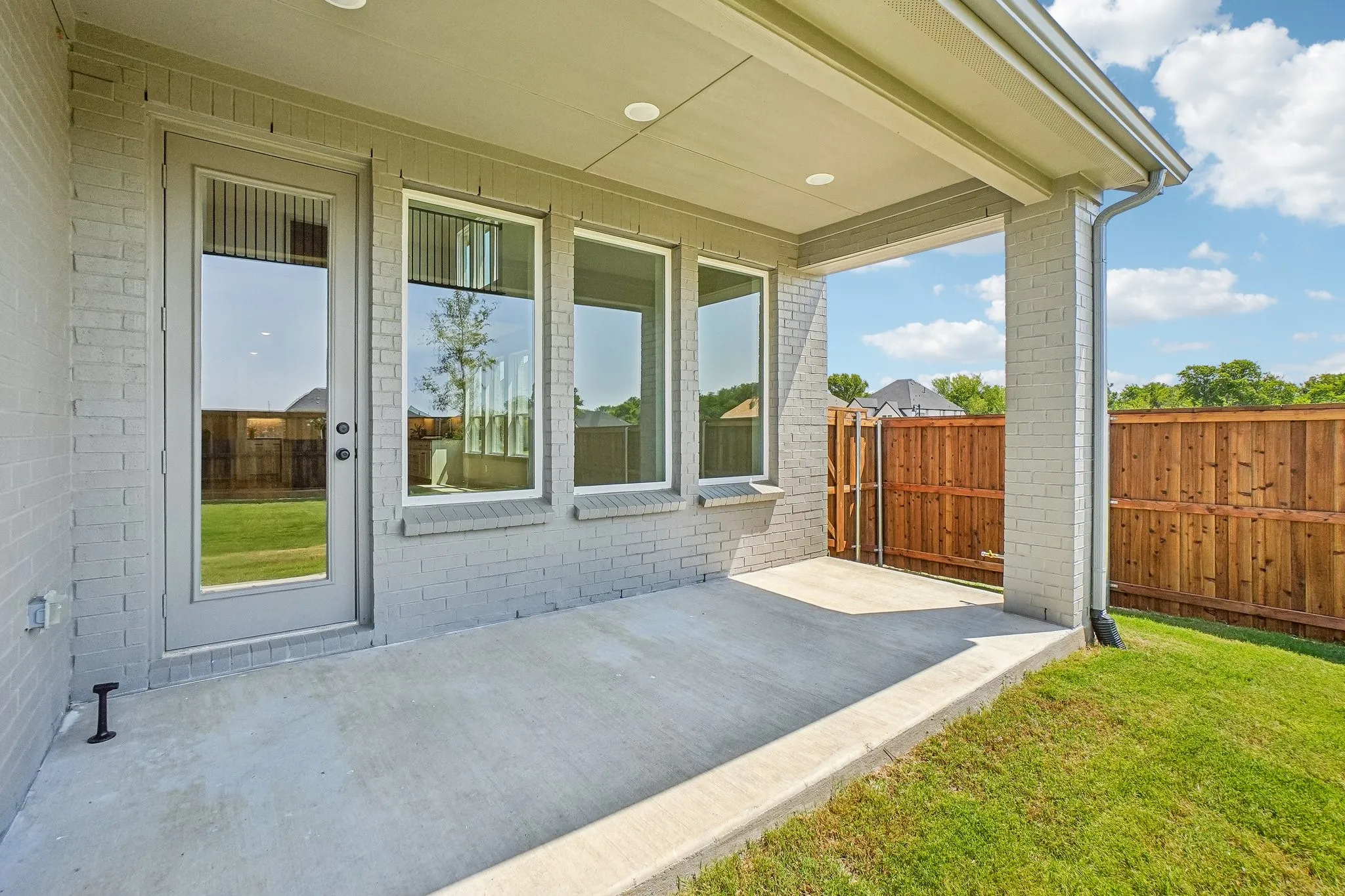 Dining al fresco is in your future on this spacious covered back patio!