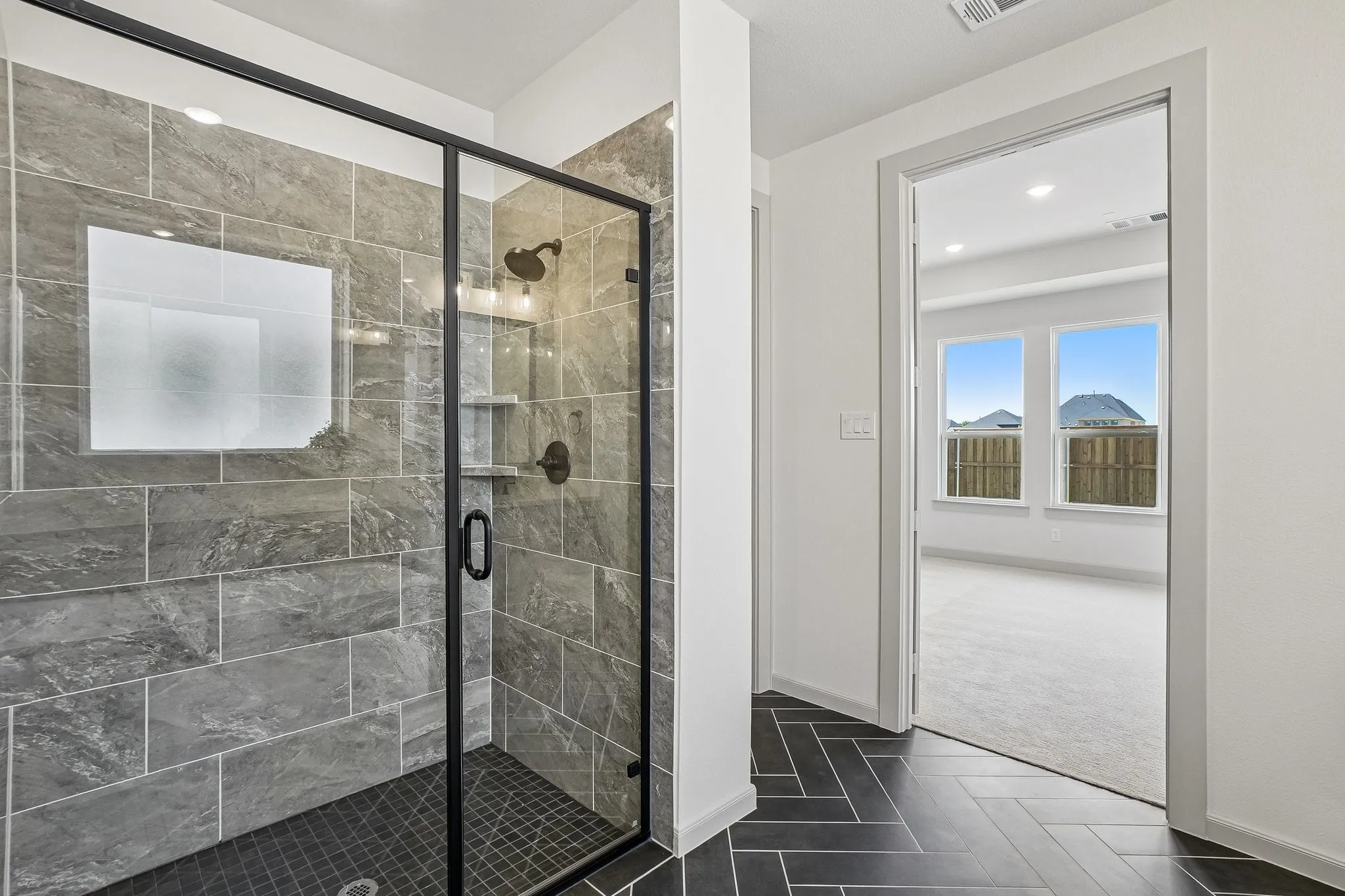 Whether it's soaking your cares away at the end of the day or taking a long, relaxing shower, this owner's bath  has it all!