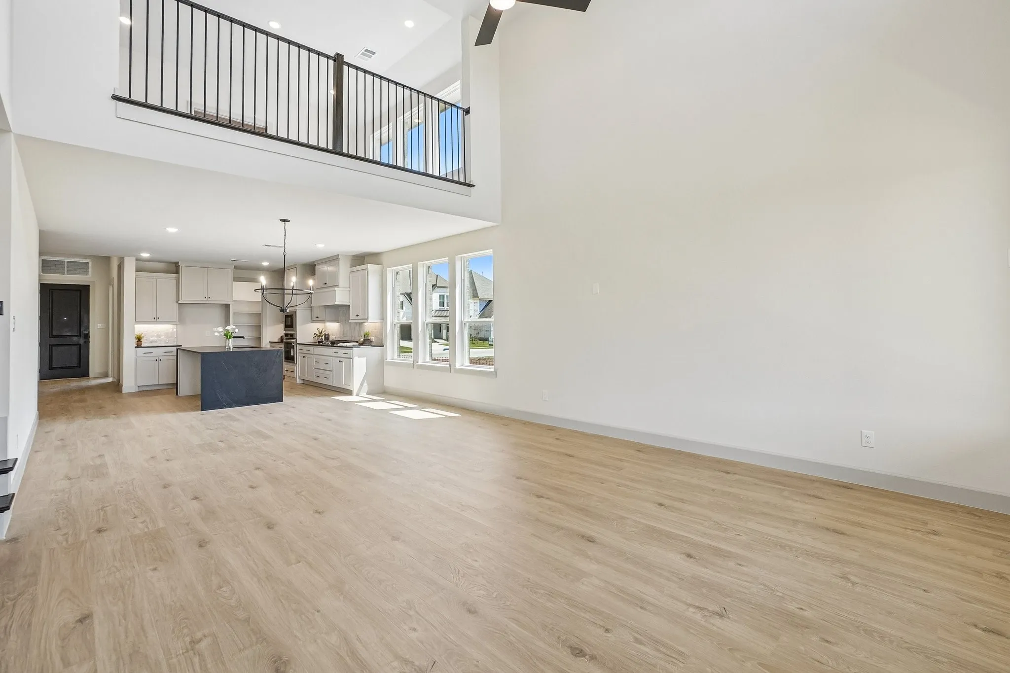 With the game room overlooking the family room, you'll enjoy multi-story entertaining in this beautiful home!