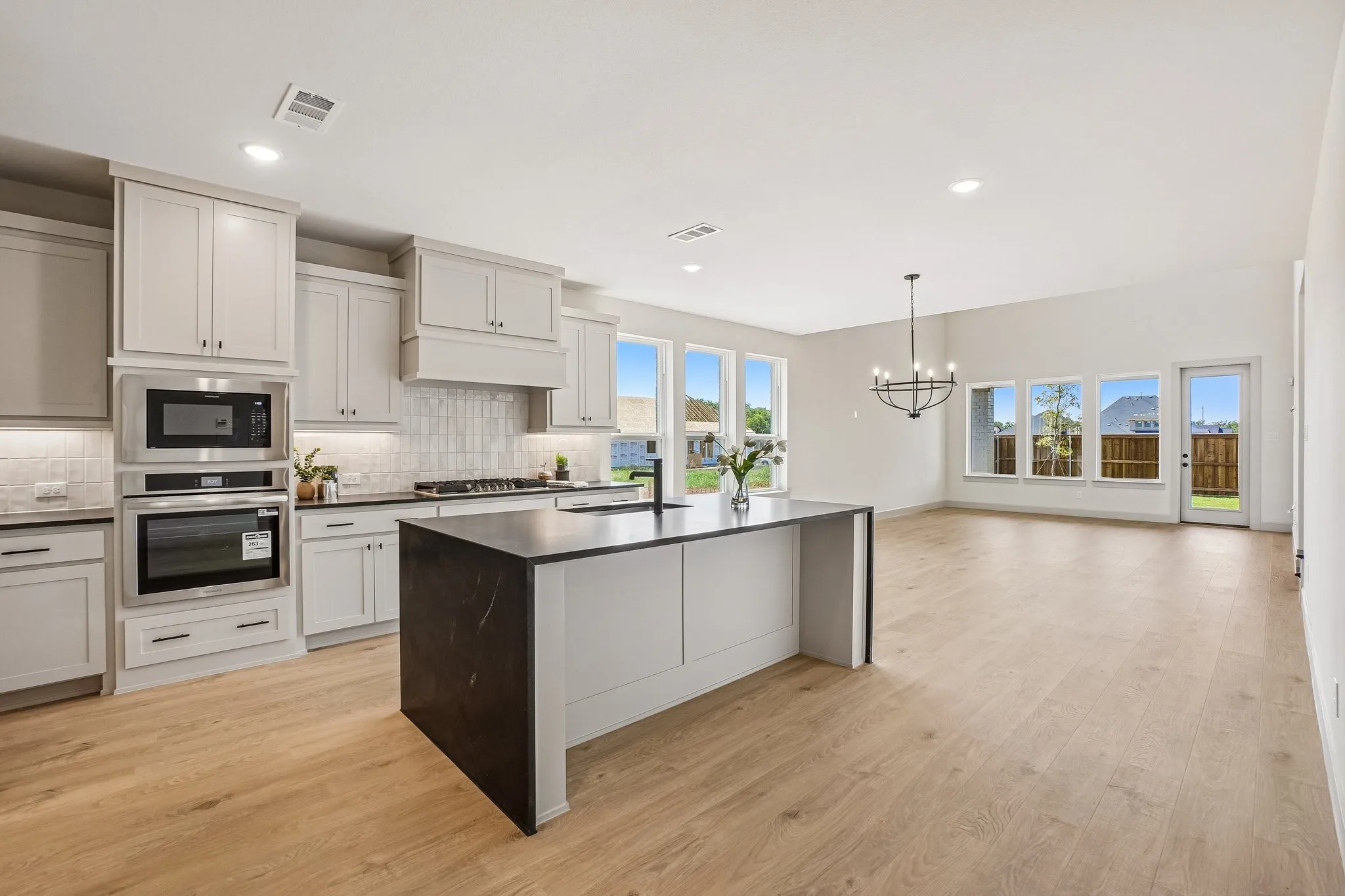Featuring a wonderful open concept design, our Orleans plan is an entertainer's dream home!