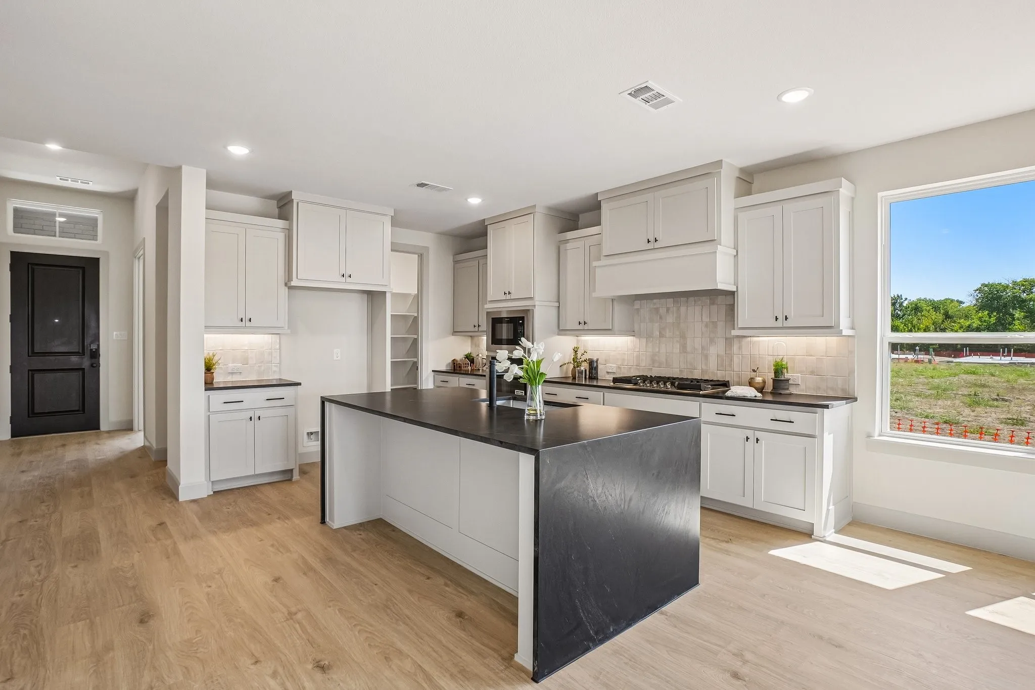 No shortage of style, storage or prep space in this fantastic kitchen!