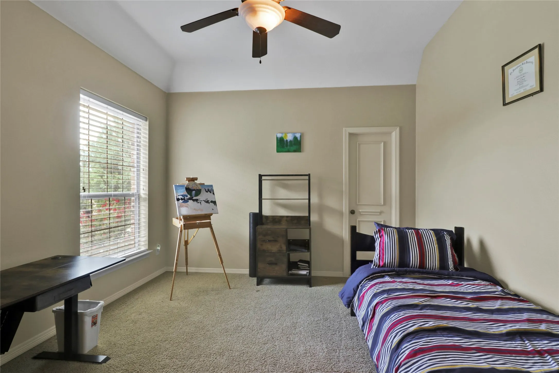 Another spacious secondary bedroom.