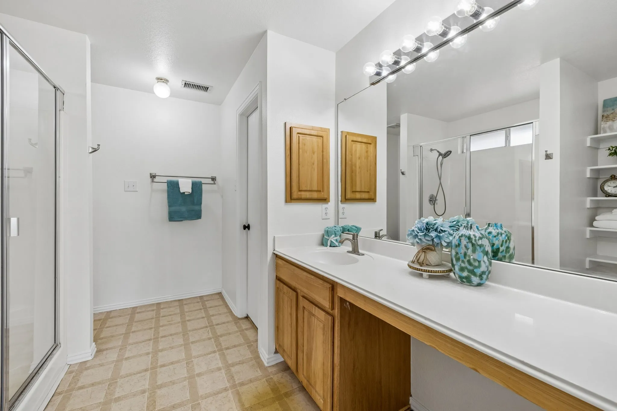 Functional primary bathroom with shower and everyday convenience.