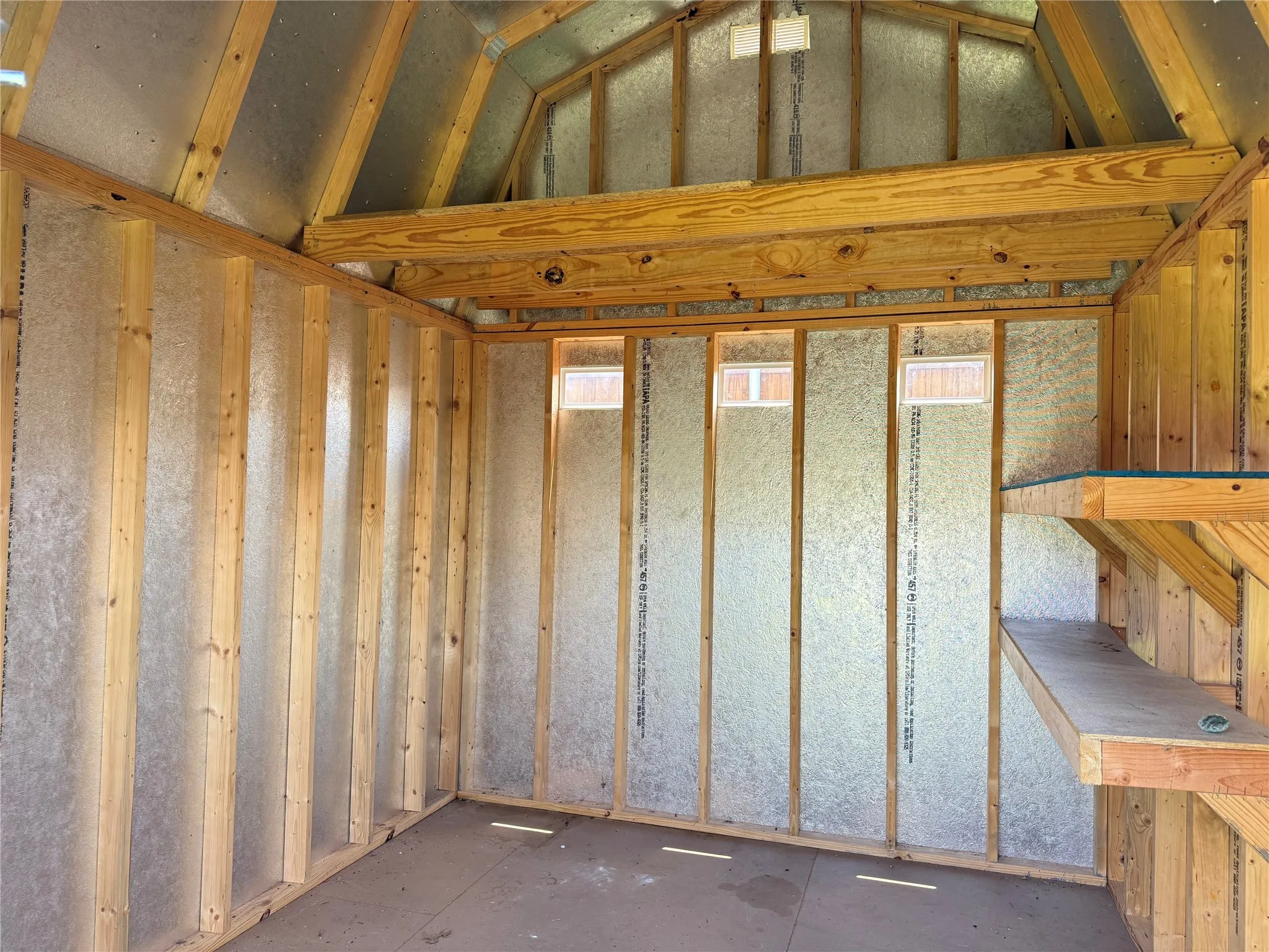 Interior of the Tuff Shed with 10 ft ceilings, offering excellent storage and flexible use potential.