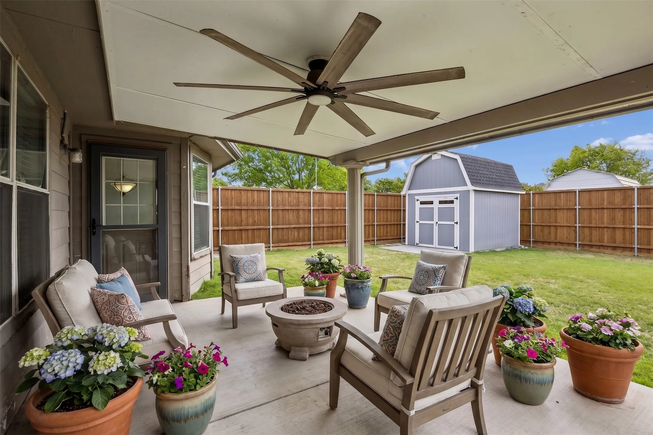 Oversized insulated covered patio designed for outdoor living and entertaining.