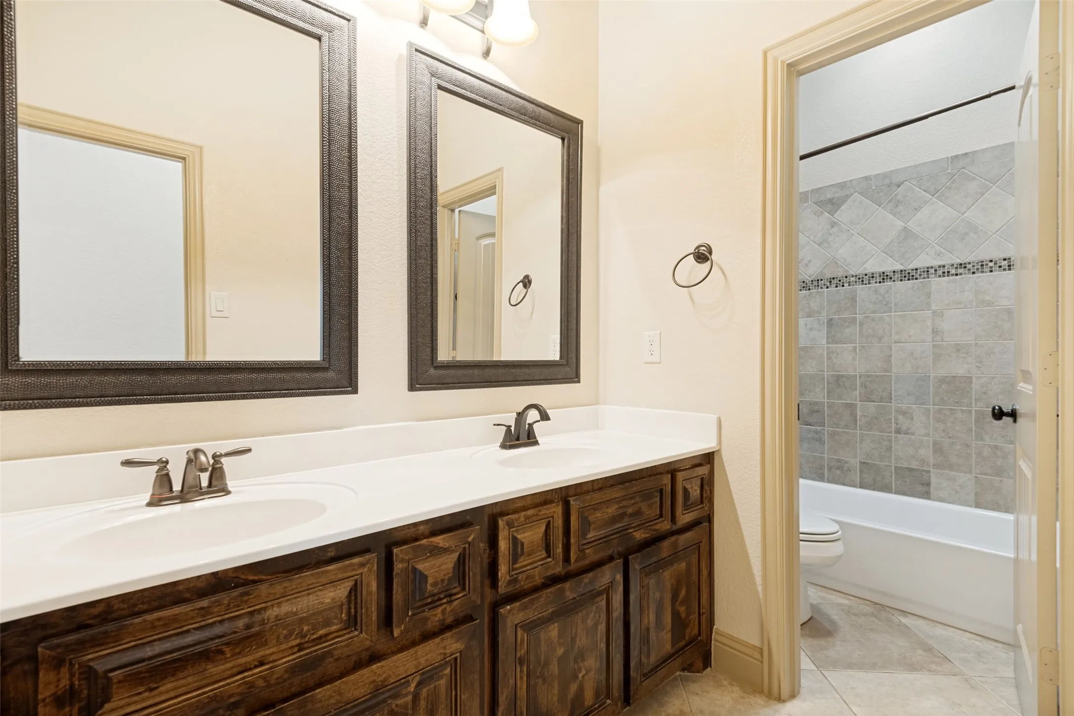 Double sinks and separate tub area.