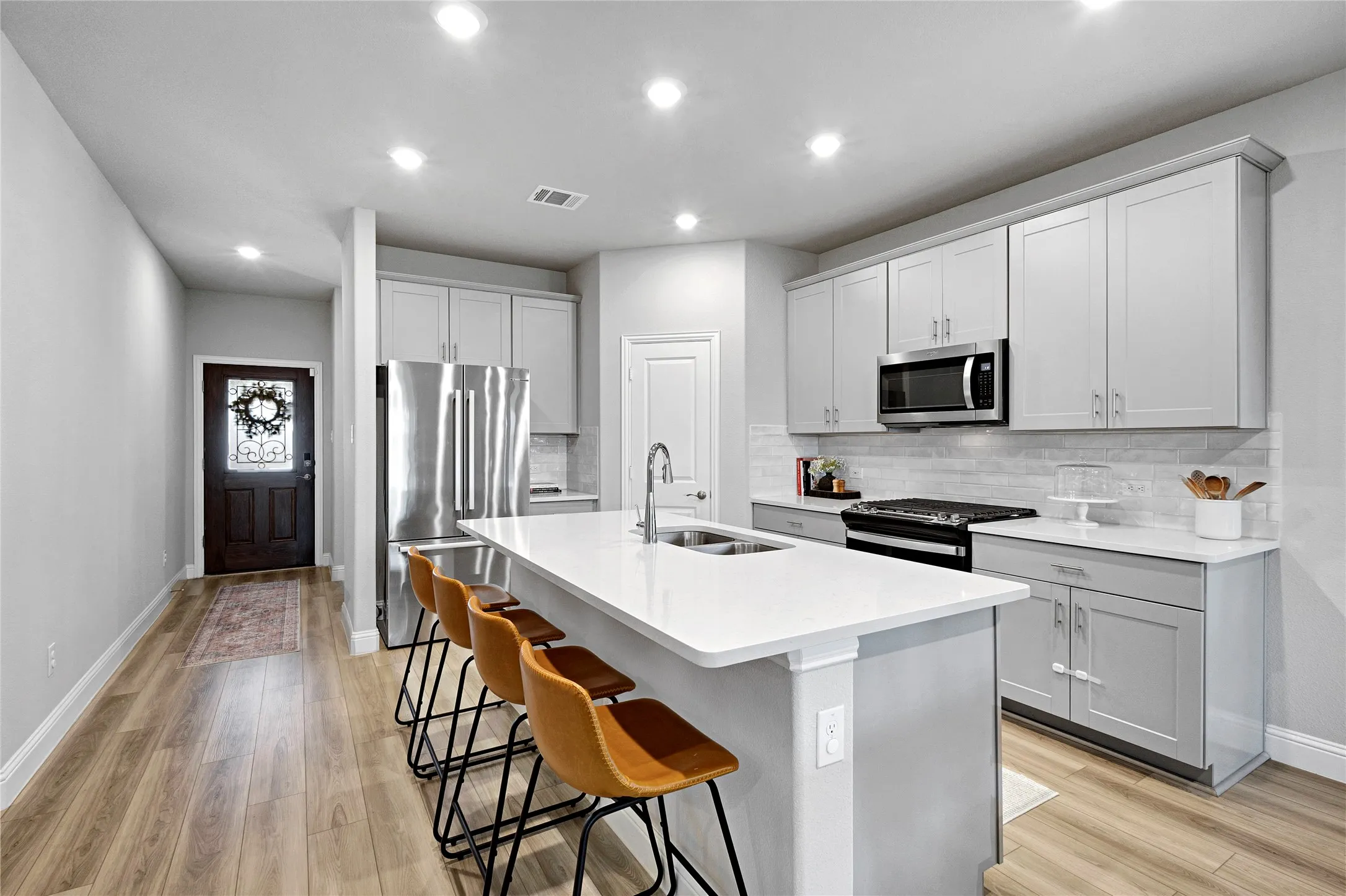 Kitchen with gas stove.