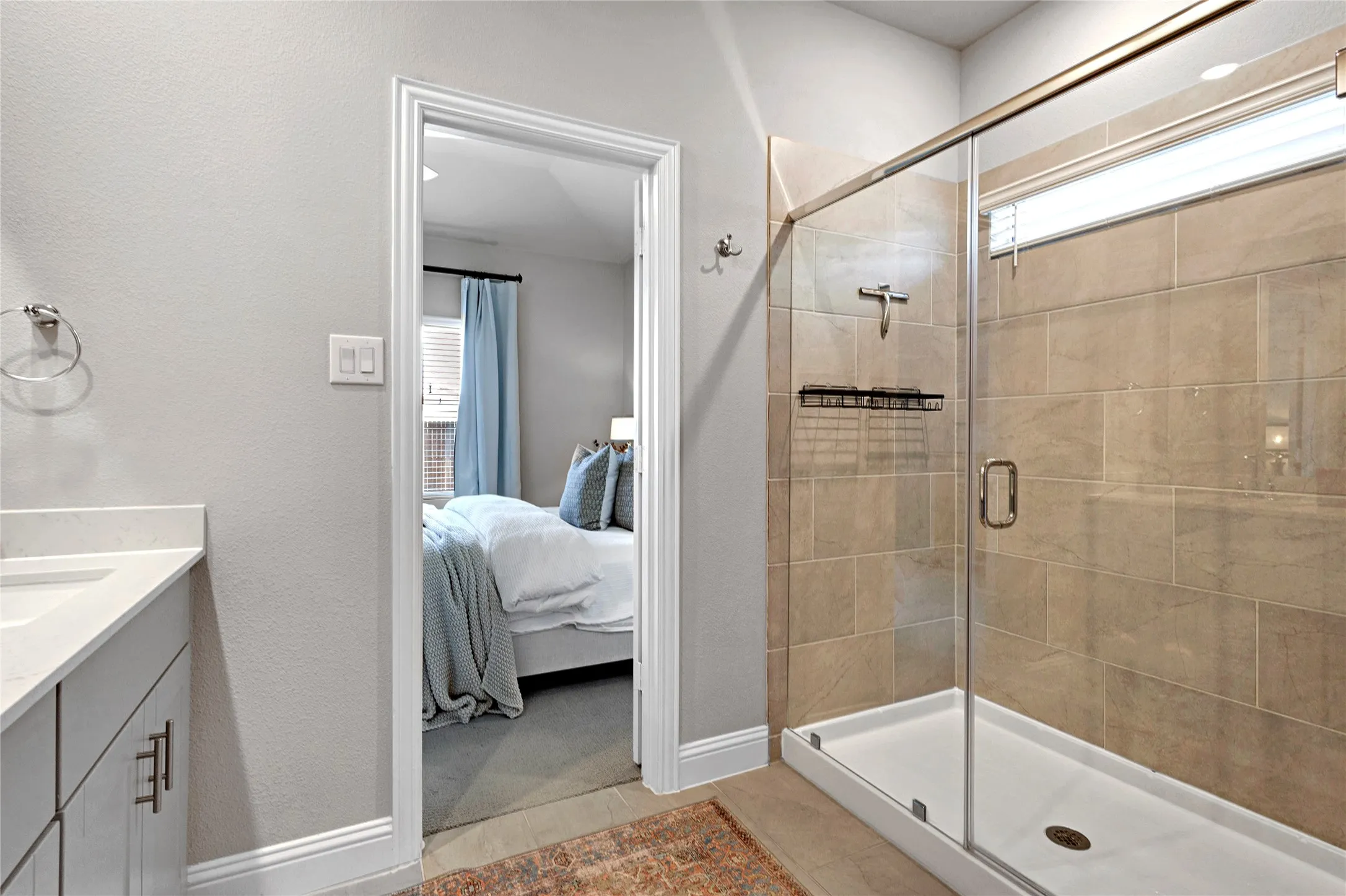 Ensuite bath with walk in spacious shower.