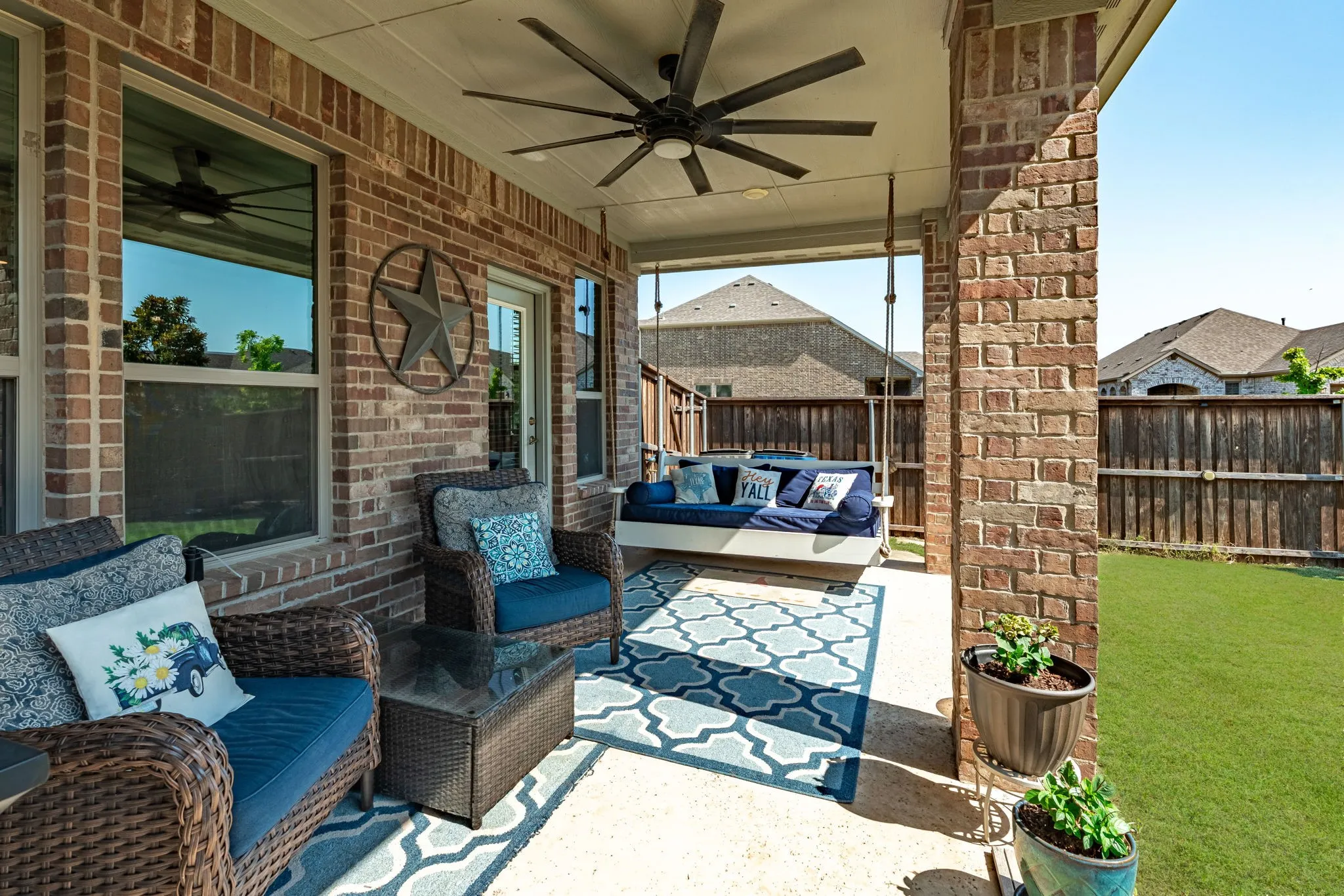 Covered patio in backyard.