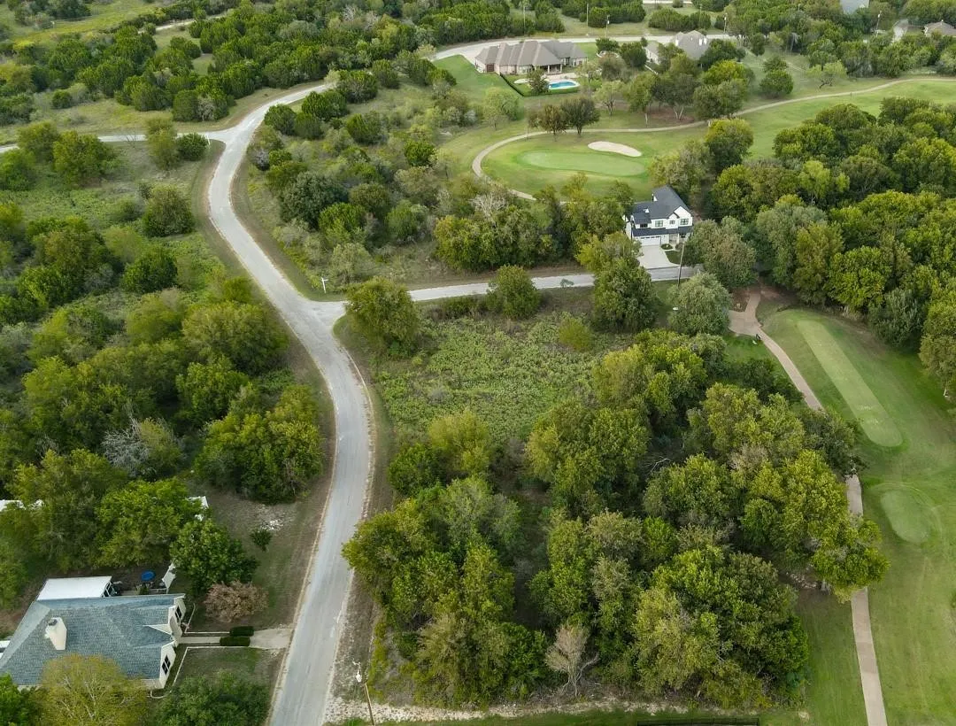 Expansive undeveloped lot featuring dense tree coverage