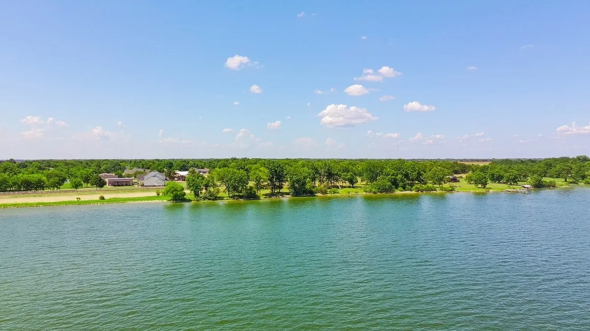 Expansive waterfront property featuring a substantial body of water