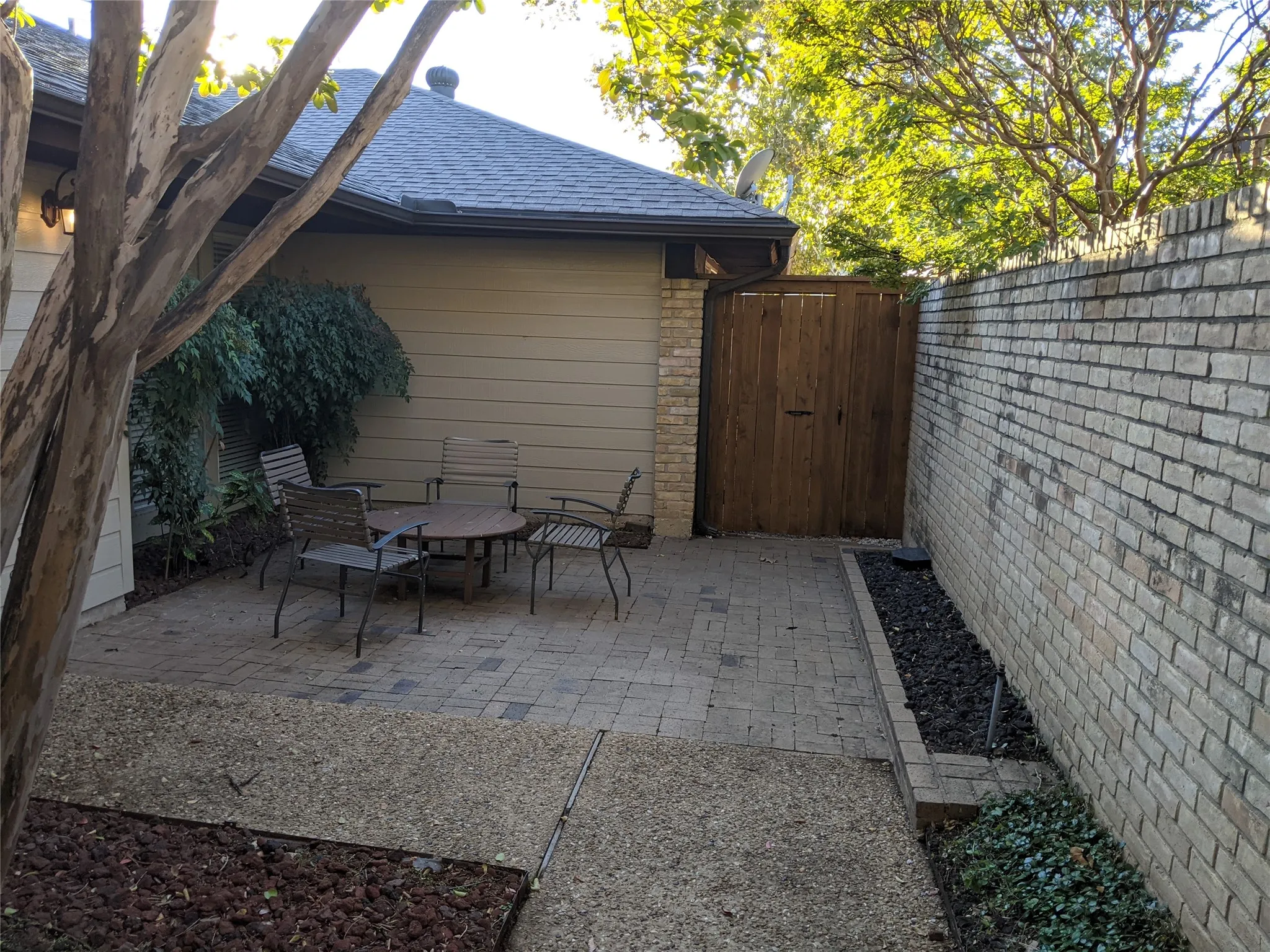 sitting area in yard next to entrance