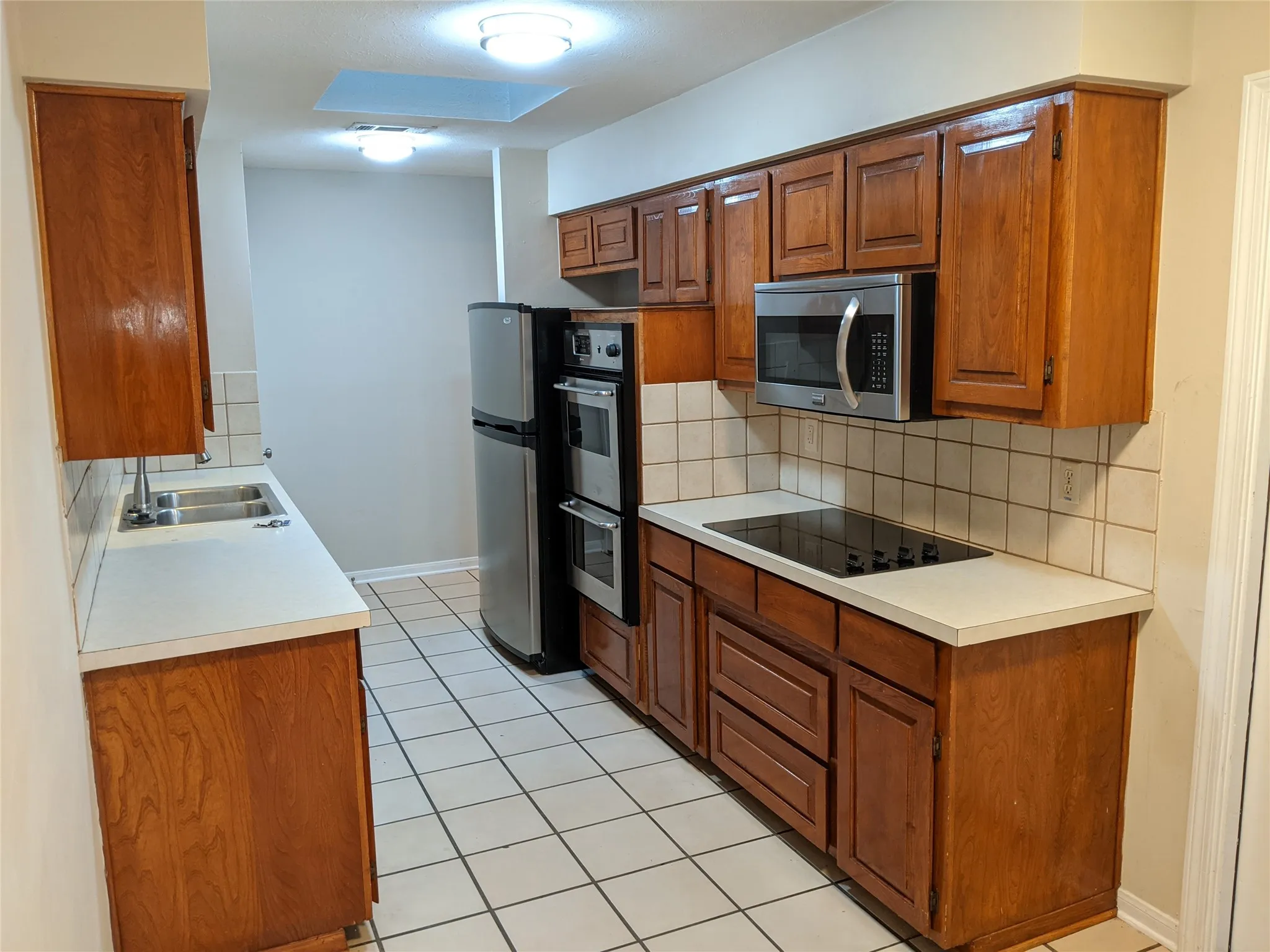 Kitchen with SS appliances