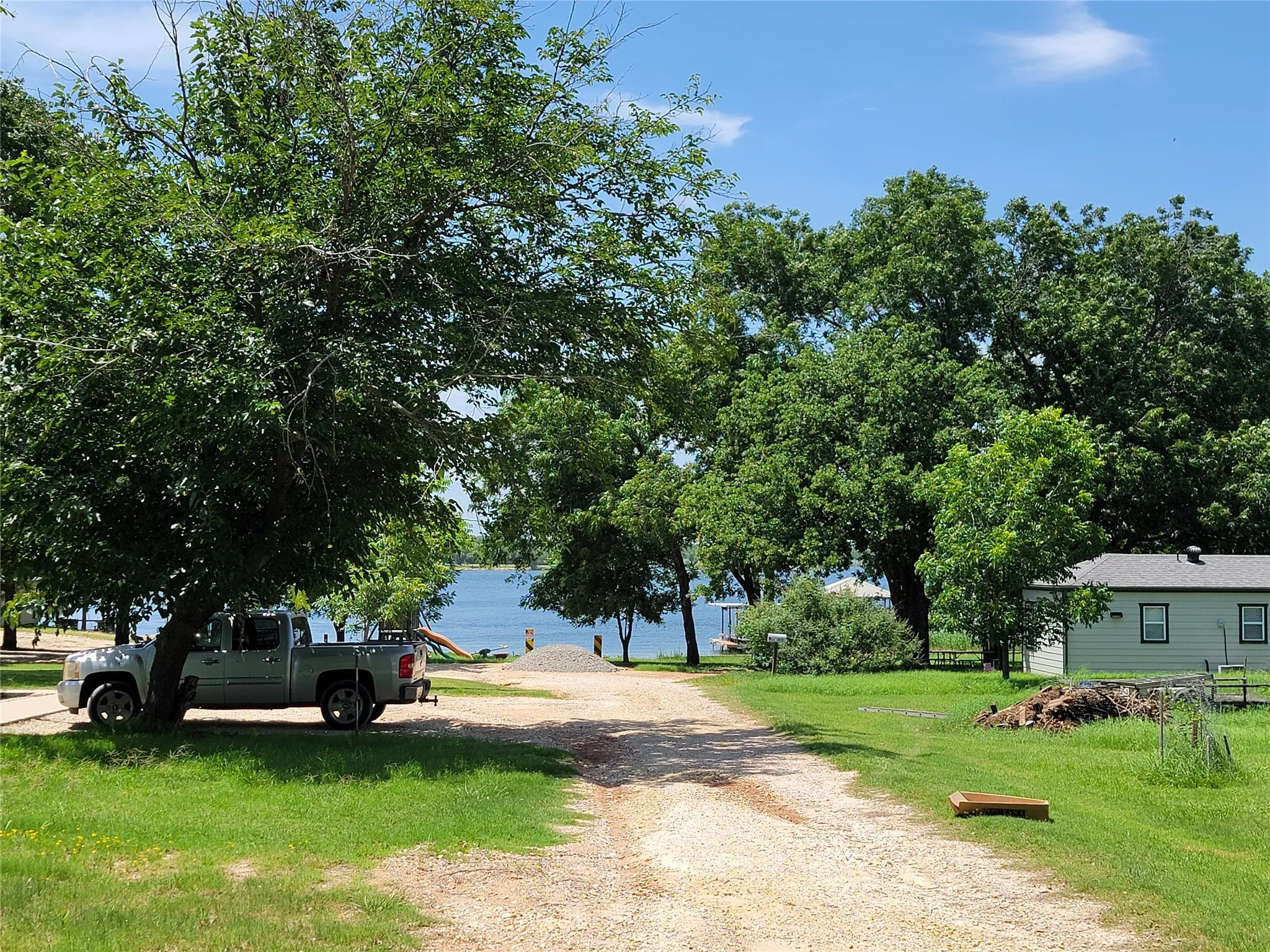 Gravel driveway providing access to a waterfront setting