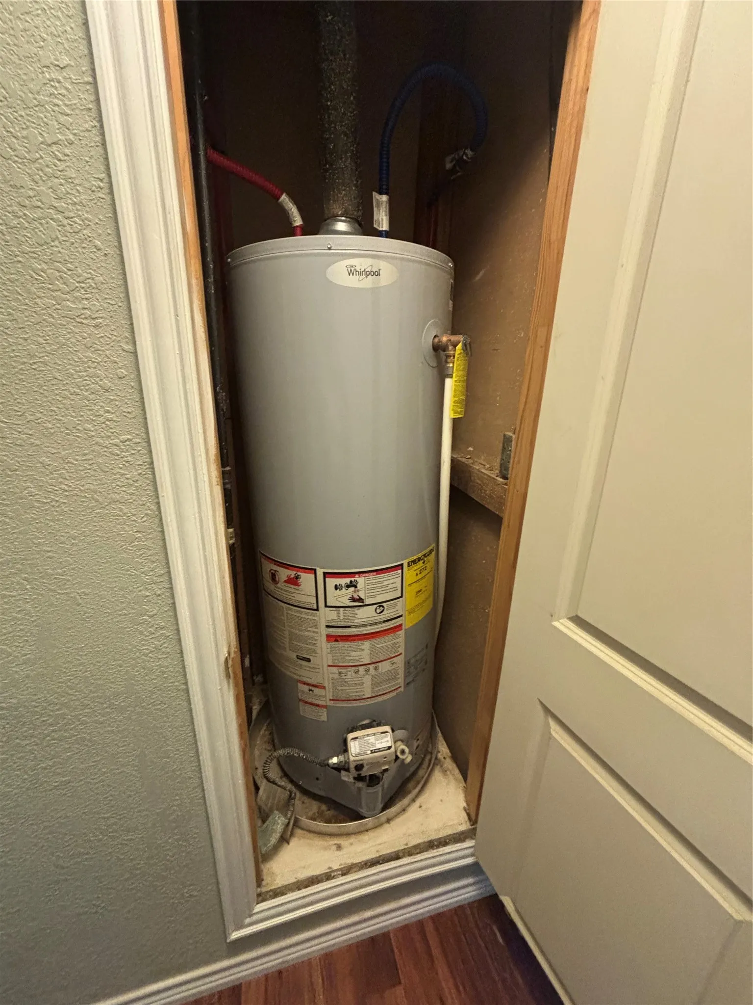 Whirlpool water heater installed in a dedicated utility closet
