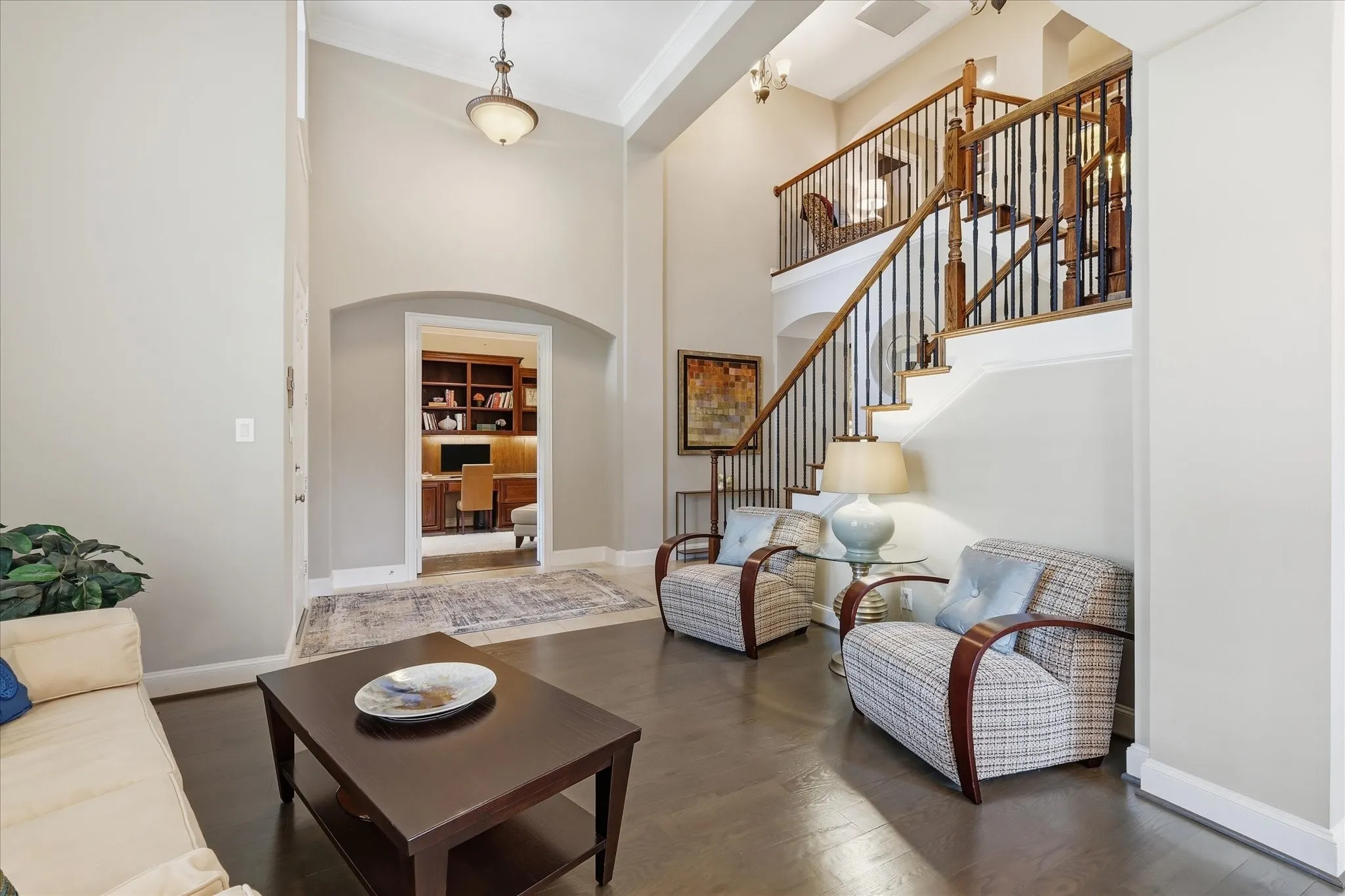 This home features beautiful hardwood floors ina gorgeous neutral stain that can accommodate any decor