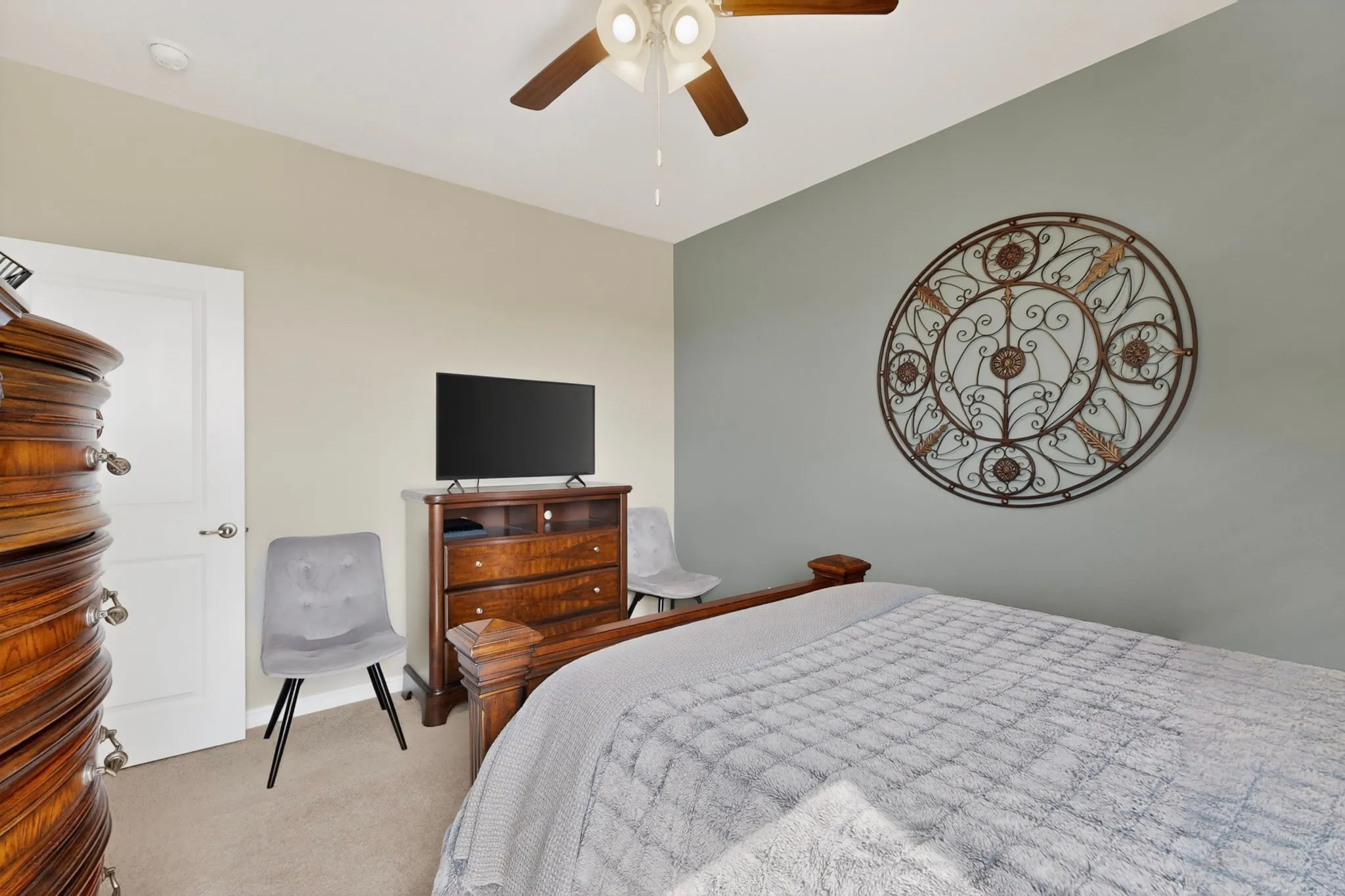 Bedroom featuring a ceiling fan, recessed lighting, and carpet flooring