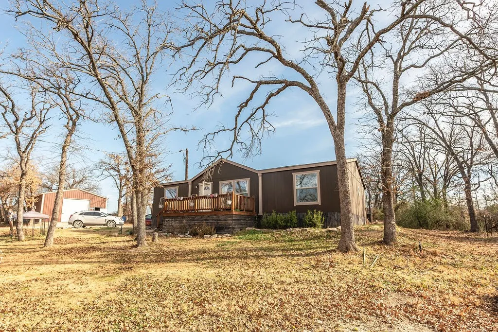 Mobile Home For Sale in Montague County , 18 Pawnee Trail, Nocona, Texas 76255, 3 Bedrooms, 2 Bathrooms, Garage spaces, 1,408 Sqft, built in 2021, Price $205,000, mls#21324599, Real Estate Agent in Nocona, Homes For Sale in Montague county, Homes For Sale in Nocona, Realtor in Nocona Texas, Real Estate Brokerage Independent Realty Texas, Luminita Cordes Realtor