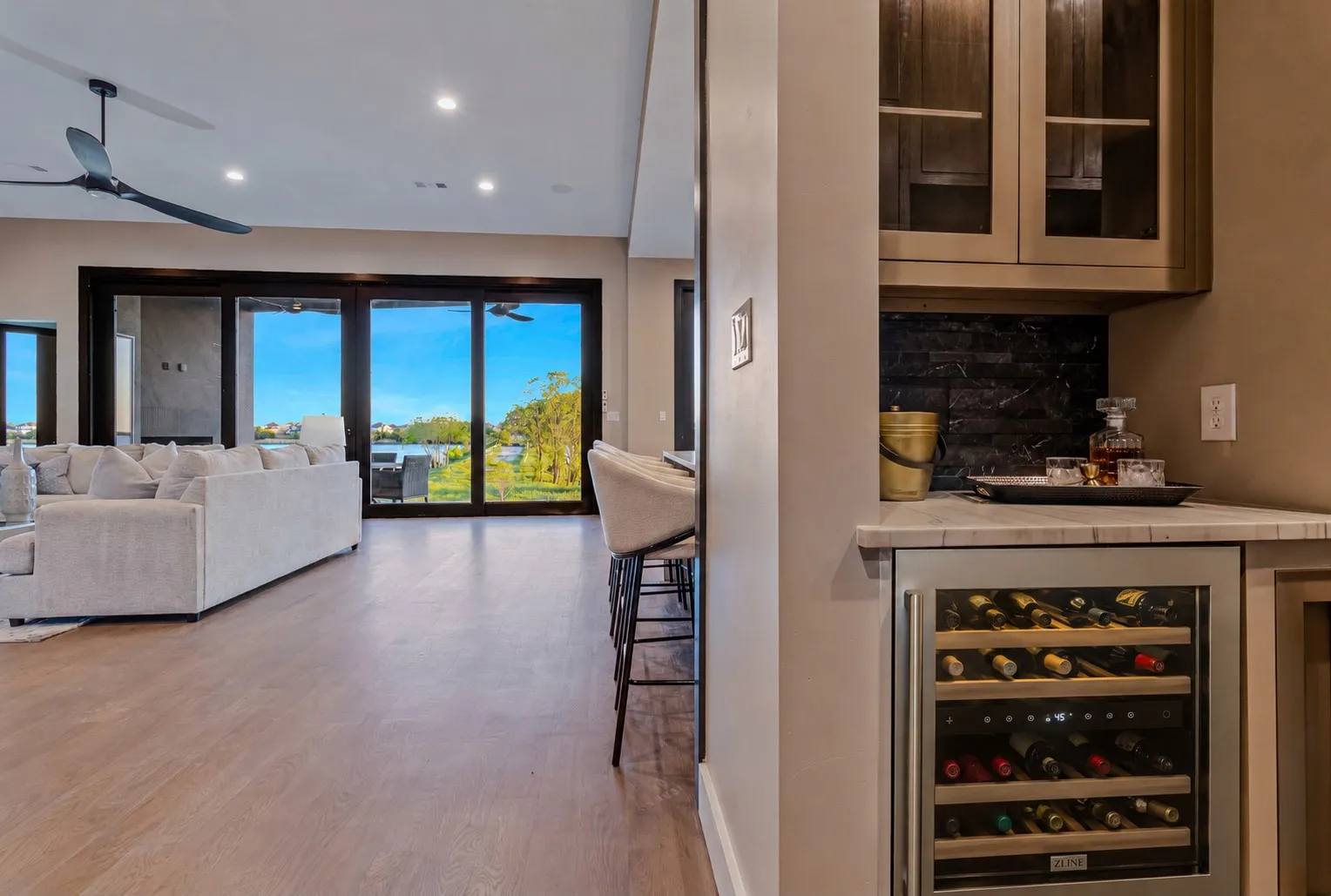 Open-concept living area with wood-finish flooring