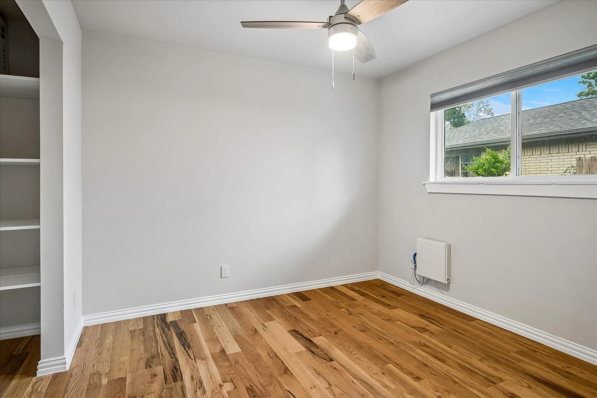 Walk-in open closet in the secondary bedroom