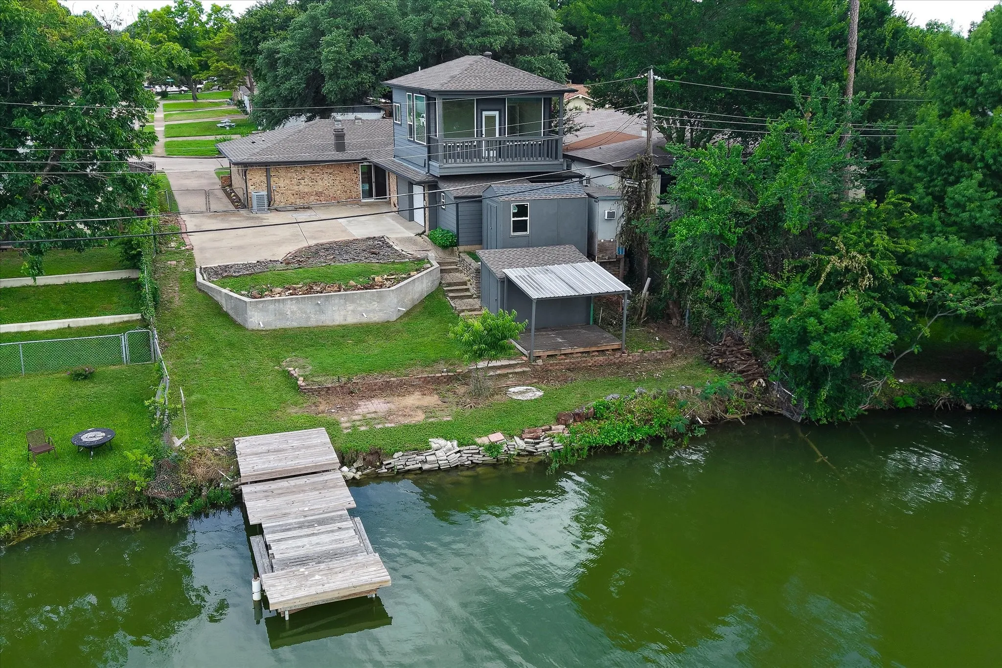 View of back of home and dock, lake.