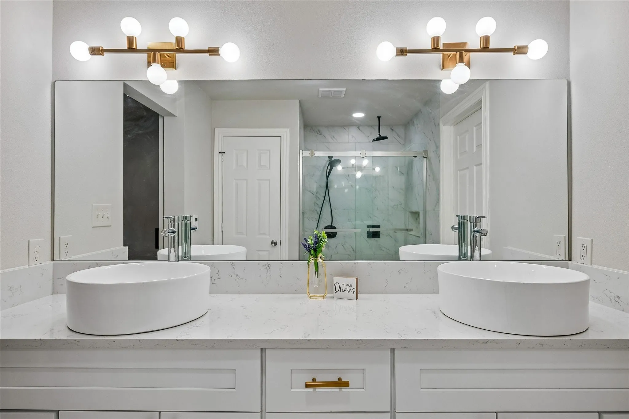 Dual Sinks in the Primary Bath with new cabinets.