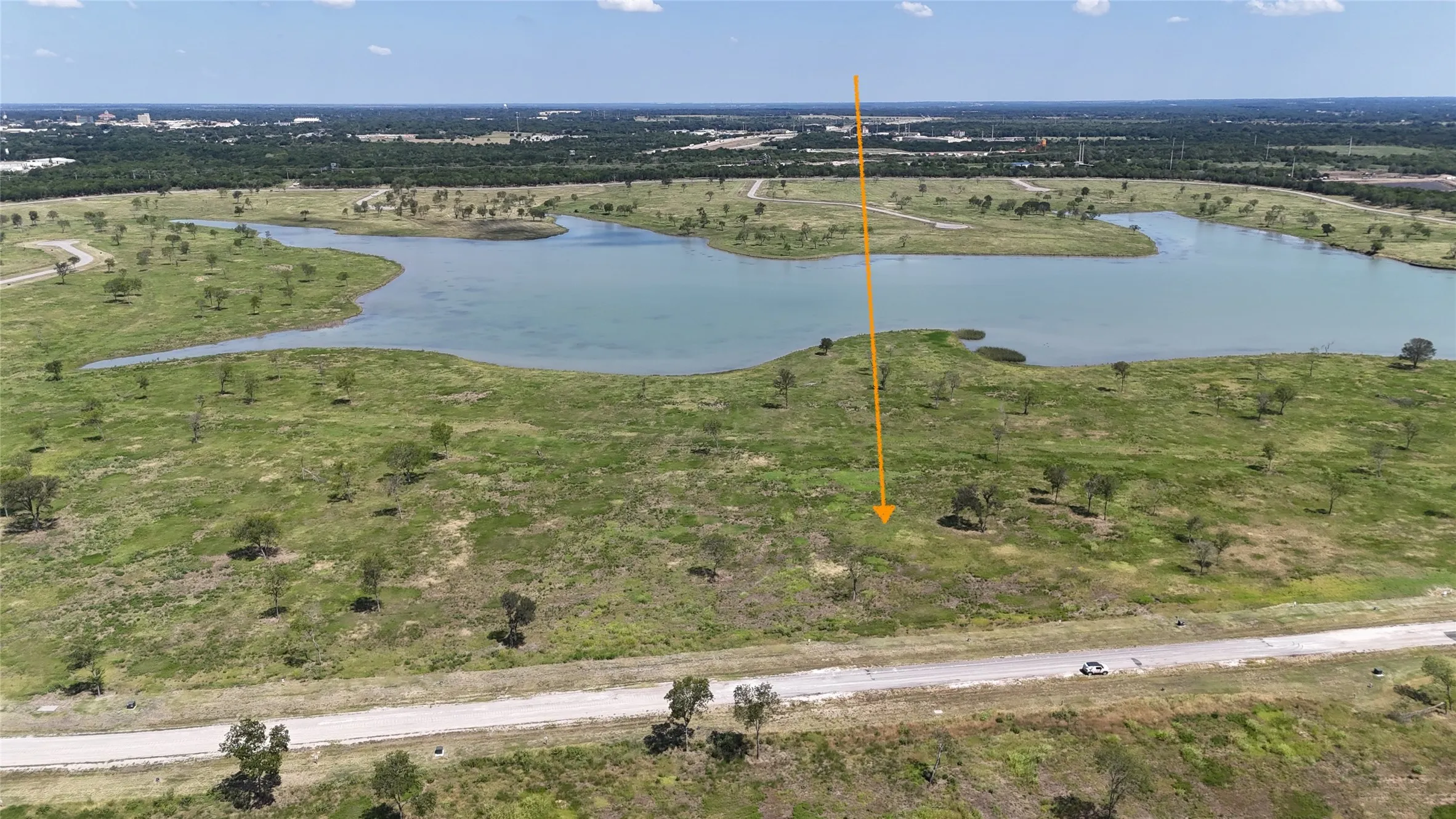Beautiful water views and open terrain make this ready-to-build property an exceptional place to call home.