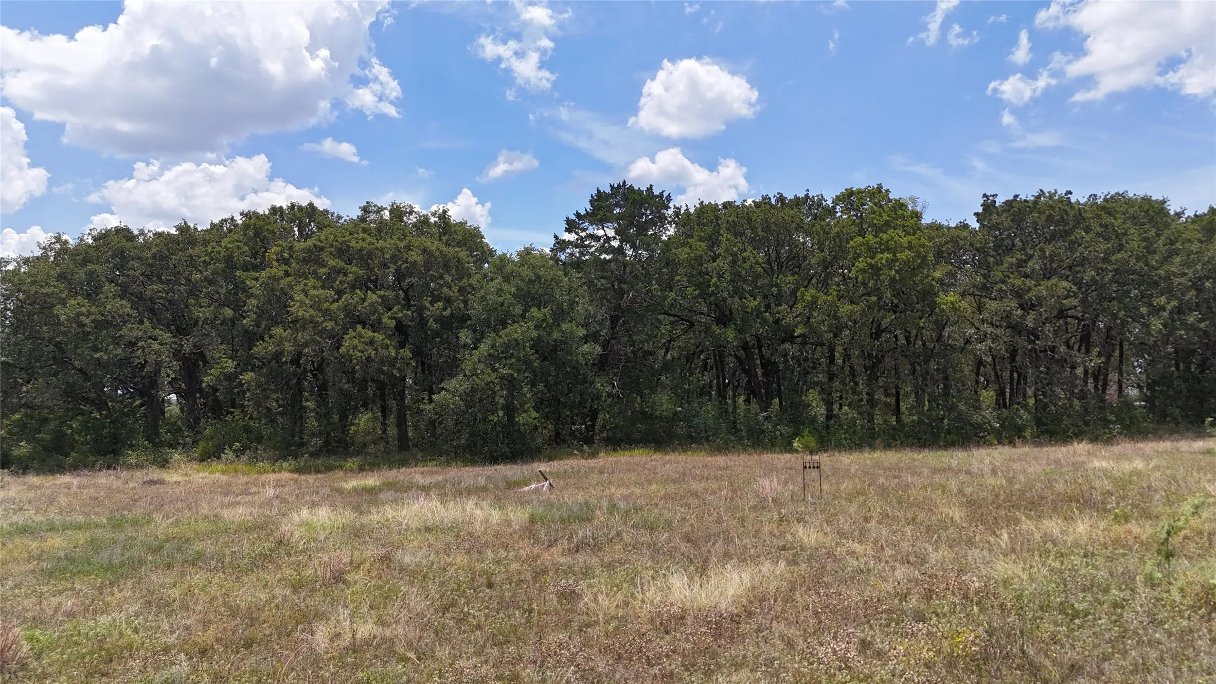 County road frontage offers convenient year-round access.