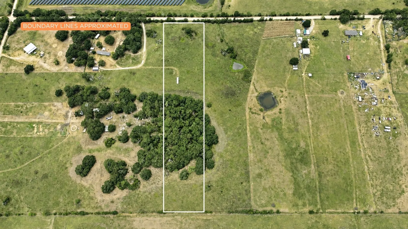Native grasses create an authentic Texas countryside setting.