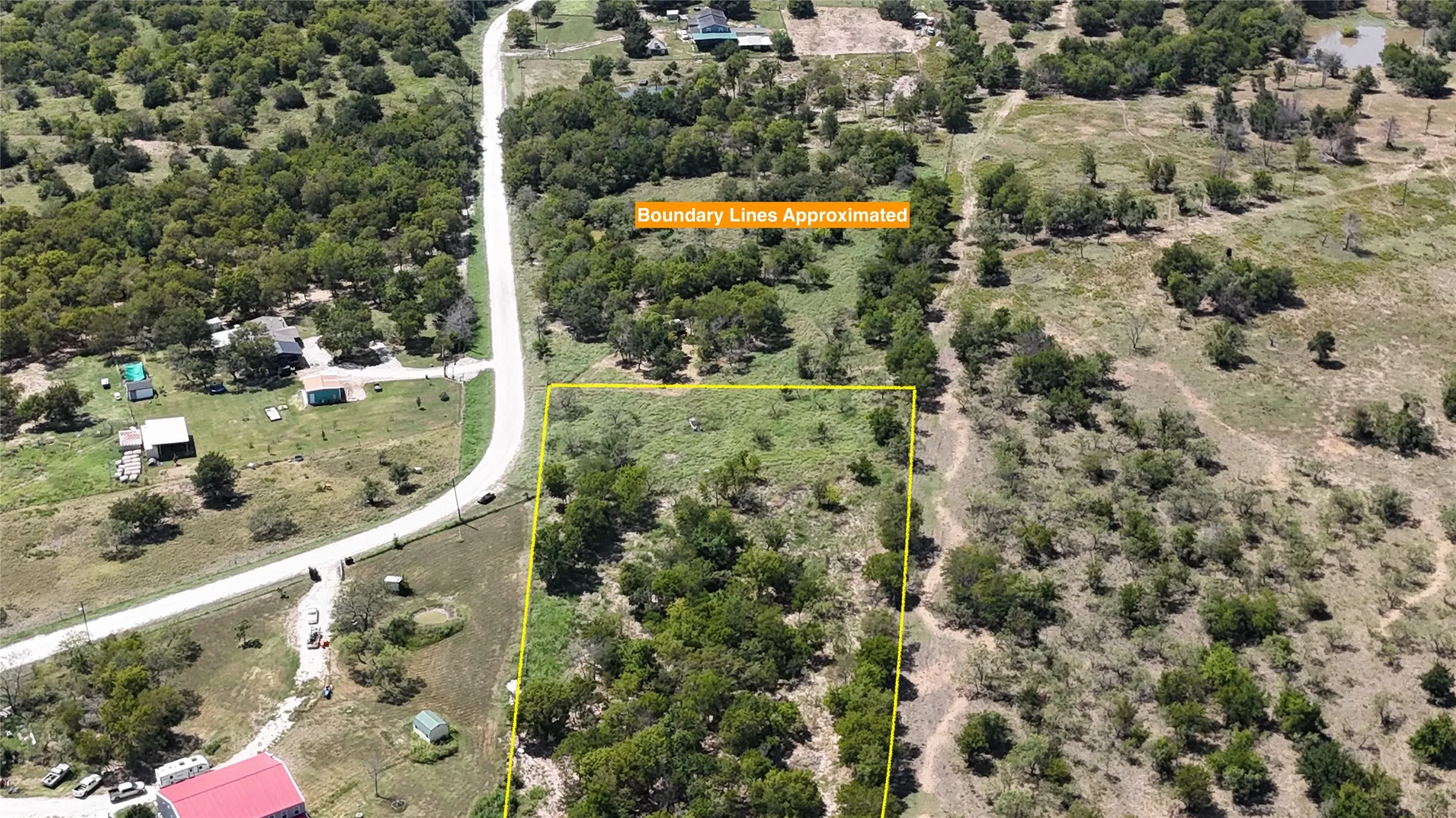 A mix of open ground and scattered trees offers flexibility when selecting the perfect homesite.