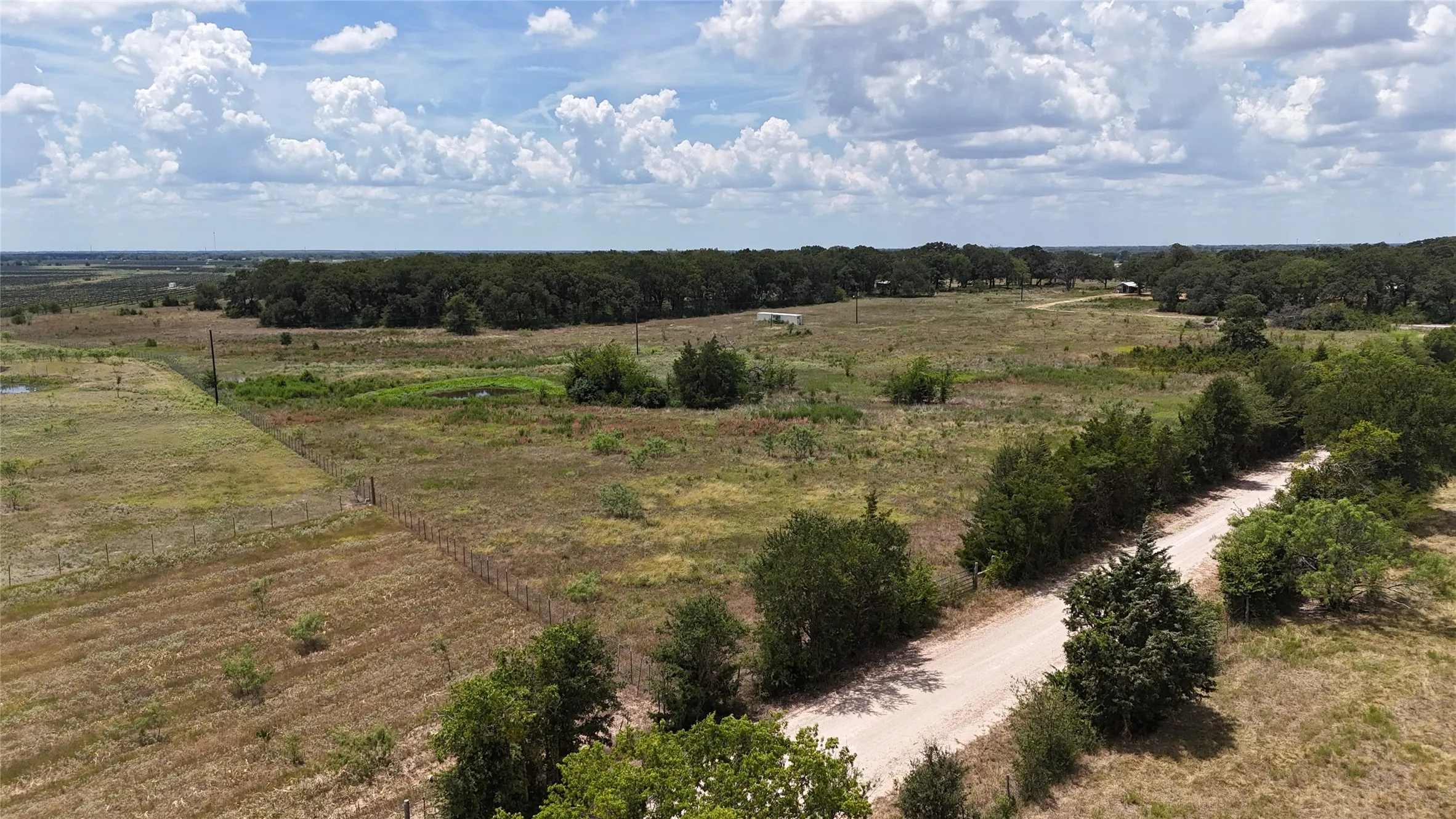 Enjoy the freedom of country living on acreage located outside the Kerens city limits.
