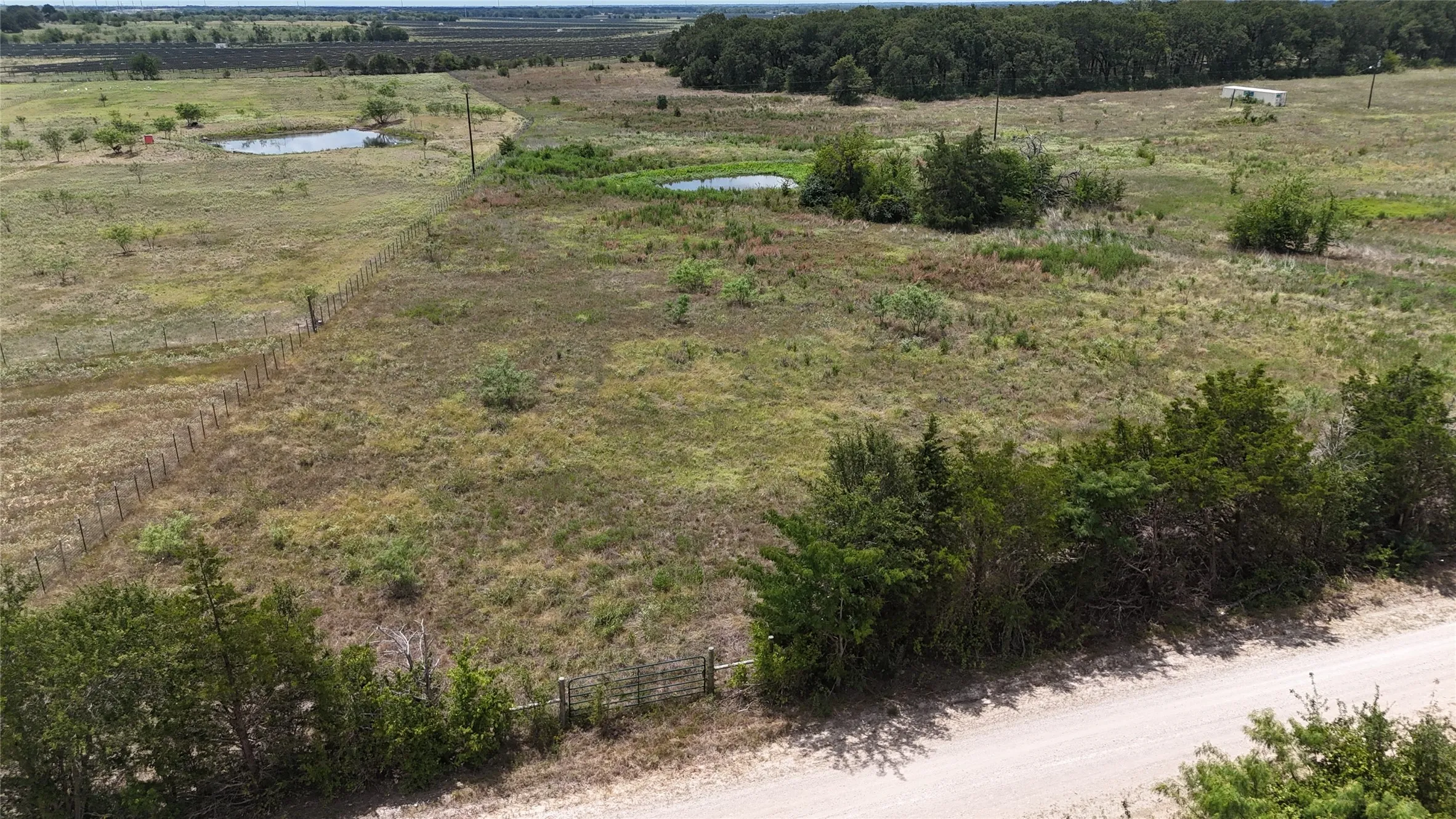 Create your ideal homesite on 6.75 acres with open pasture, scattered trees, and peaceful surroundings.
