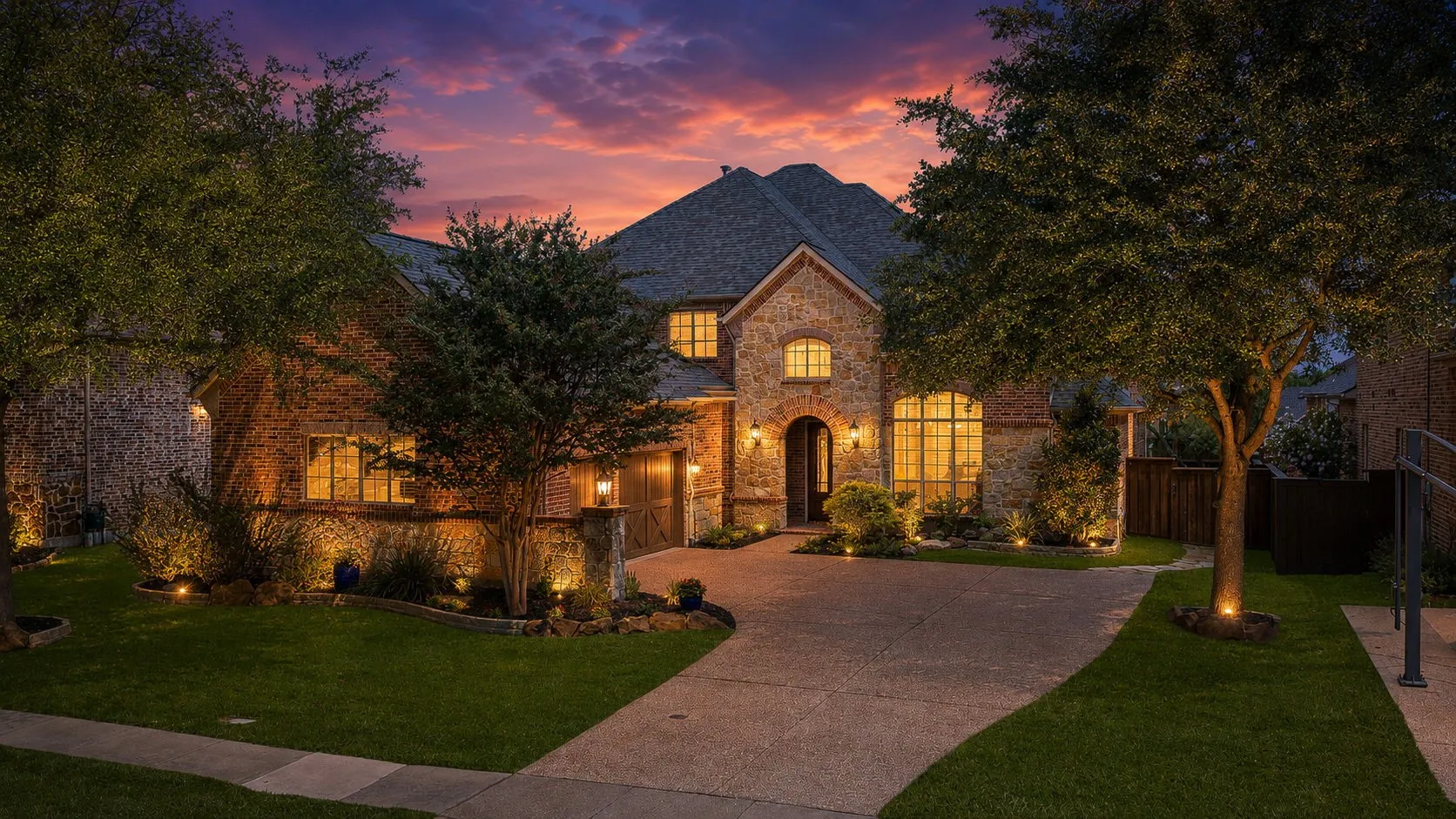 Stone and brick exterior with a multi-level roofline