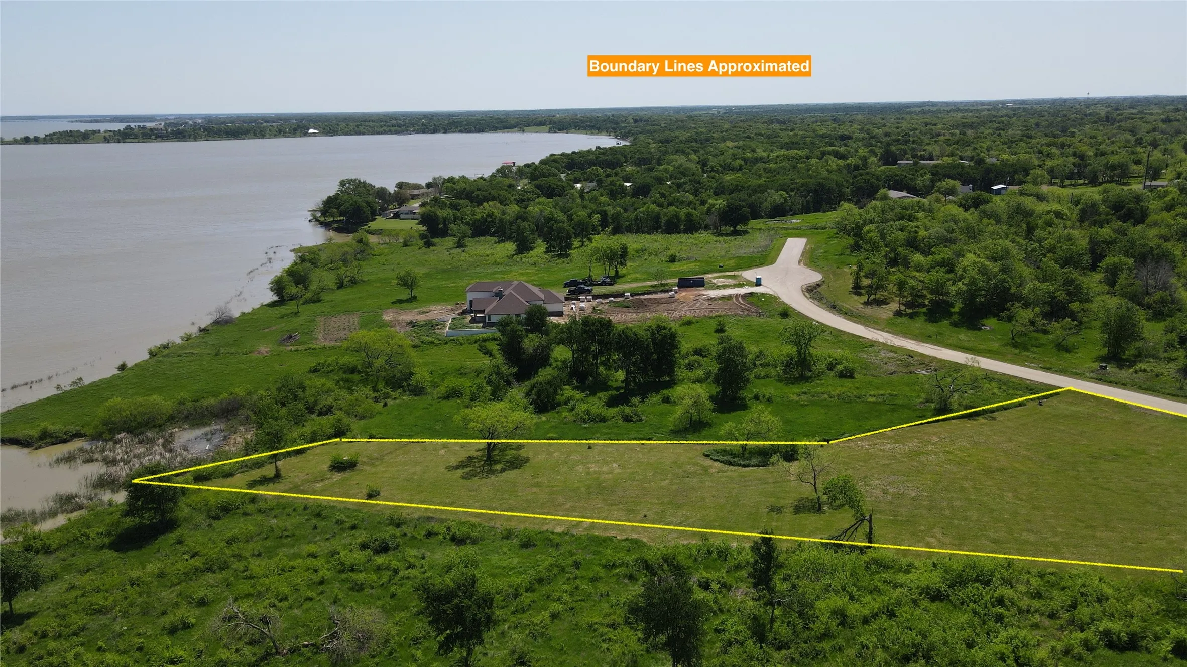An aerial view highlights the property's generous dimensions and its close proximity to Richland Chambers Lake.