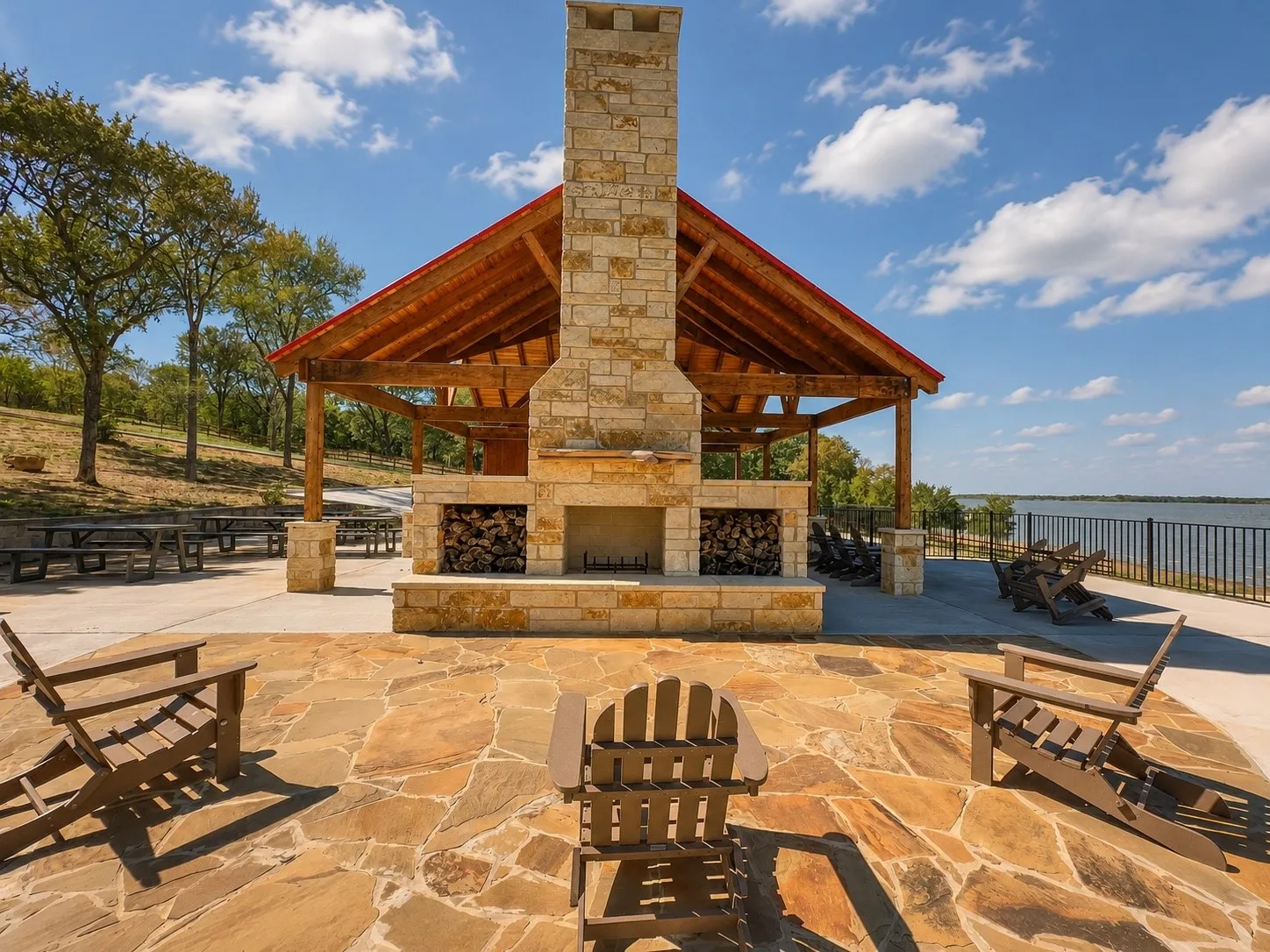 The covered lakeside pavilion creates the perfect gathering place for neighborhood events, cookouts, and relaxing afternoons.