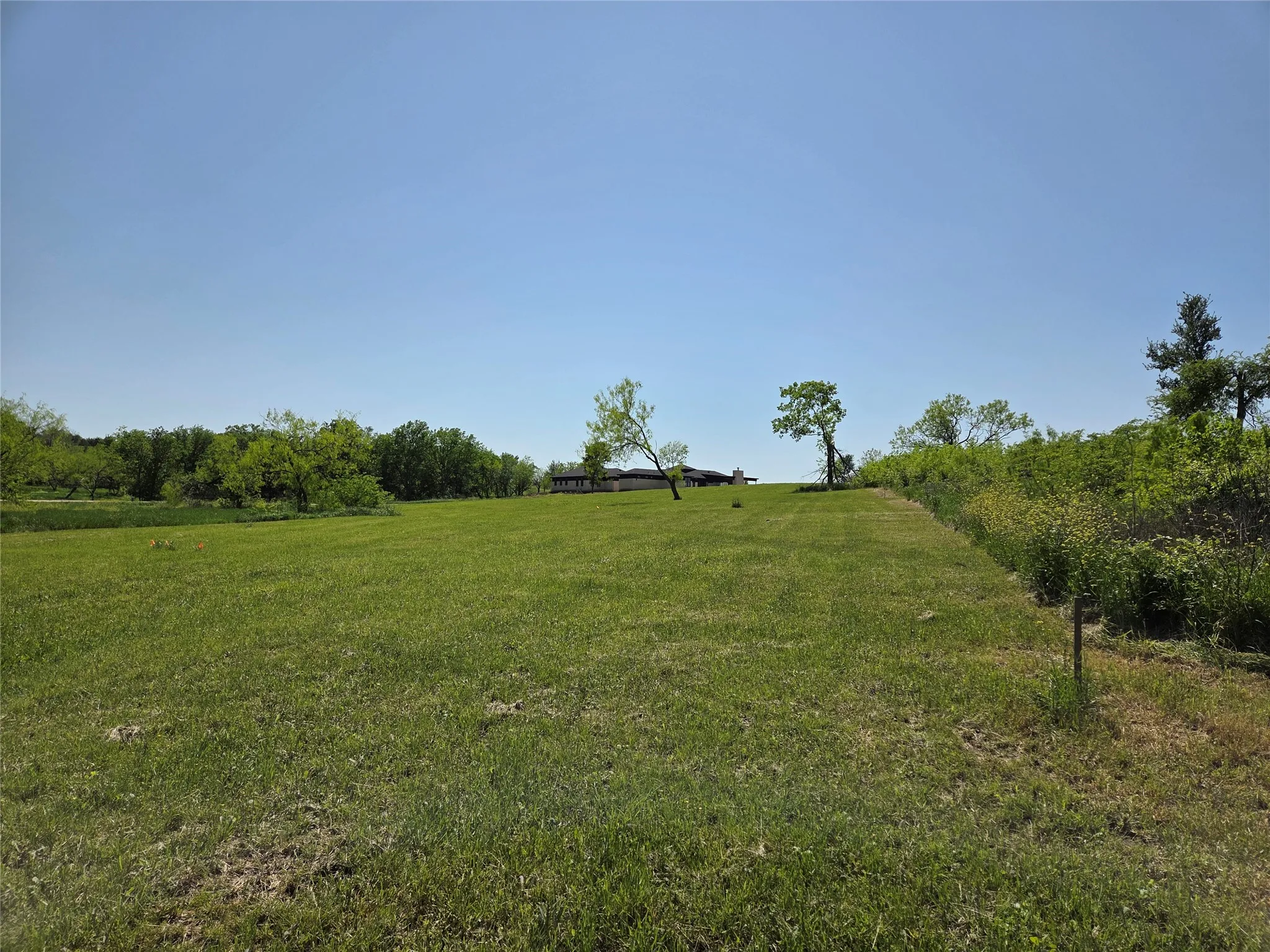 This elevated perspective showcases the property's location within the growing Richland Park lake community.