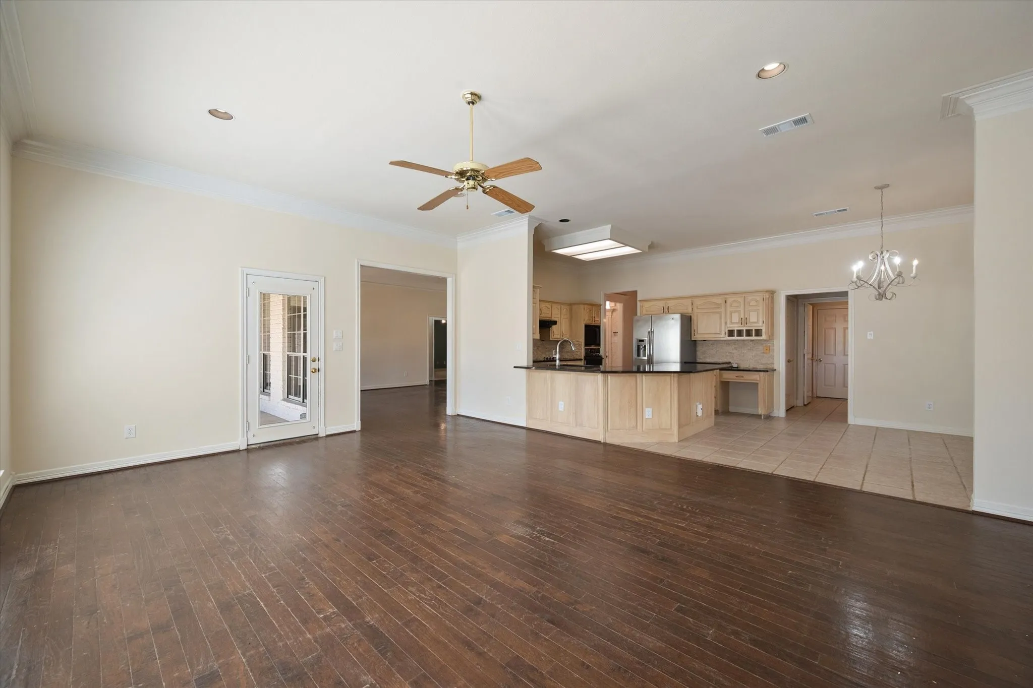 Family room is open to kitchen and breakfast area. Perfect for entertaining family and friends