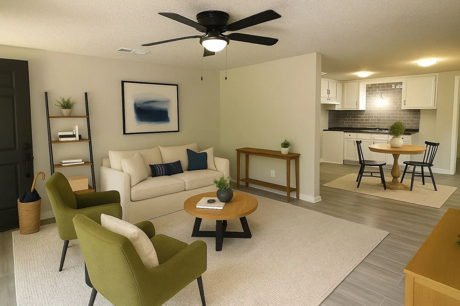 Living room featuring light wood-type flooring, a textured ceiling, and ceiling fan